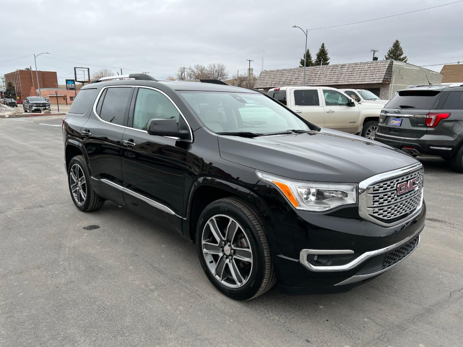 2018 Black /Tan GMC Acadia Denali AWD (1GKKNXLS3JZ) with an 3.6L V6 DOHC 24V engine, 6A transmission, located at 116 5th Avenue South, Lewistown, MT, 59457, 47.063877, -109.427879 - Clean, One Owner Car Fax on this Lease Return 2018 GMC Acadia Denali AWD! With a carlike ride and lighter construction (which allows for downsized, more fuel-efficient engines), large crossovers have largely supplanted traditional sport-utility vehicles. It was only natural that GMC — then know - Photo #0