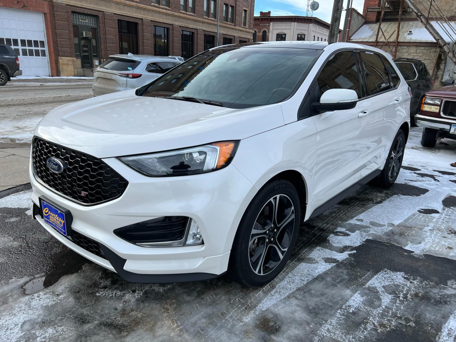 2019 WHITE /Black Ford Edge Sport AWD (2FMPK4AP7KB) with an 2.7L V6 DOCH 24V engine, 6A transmission, located at 116 5th Avenue South, Lewistown, MT, 59457, 47.063877, -109.427879 - Experience the perfect blend of power and luxury with the 2019 Ford Edge ST AWD. With a 2.7L engine and low miles, this vehicle will take you on a thrilling ride every time. The added convenience of a sunroof and a clean one-owner CarFax report make this SUV a must-have. Don't miss out on this incre - Photo #0