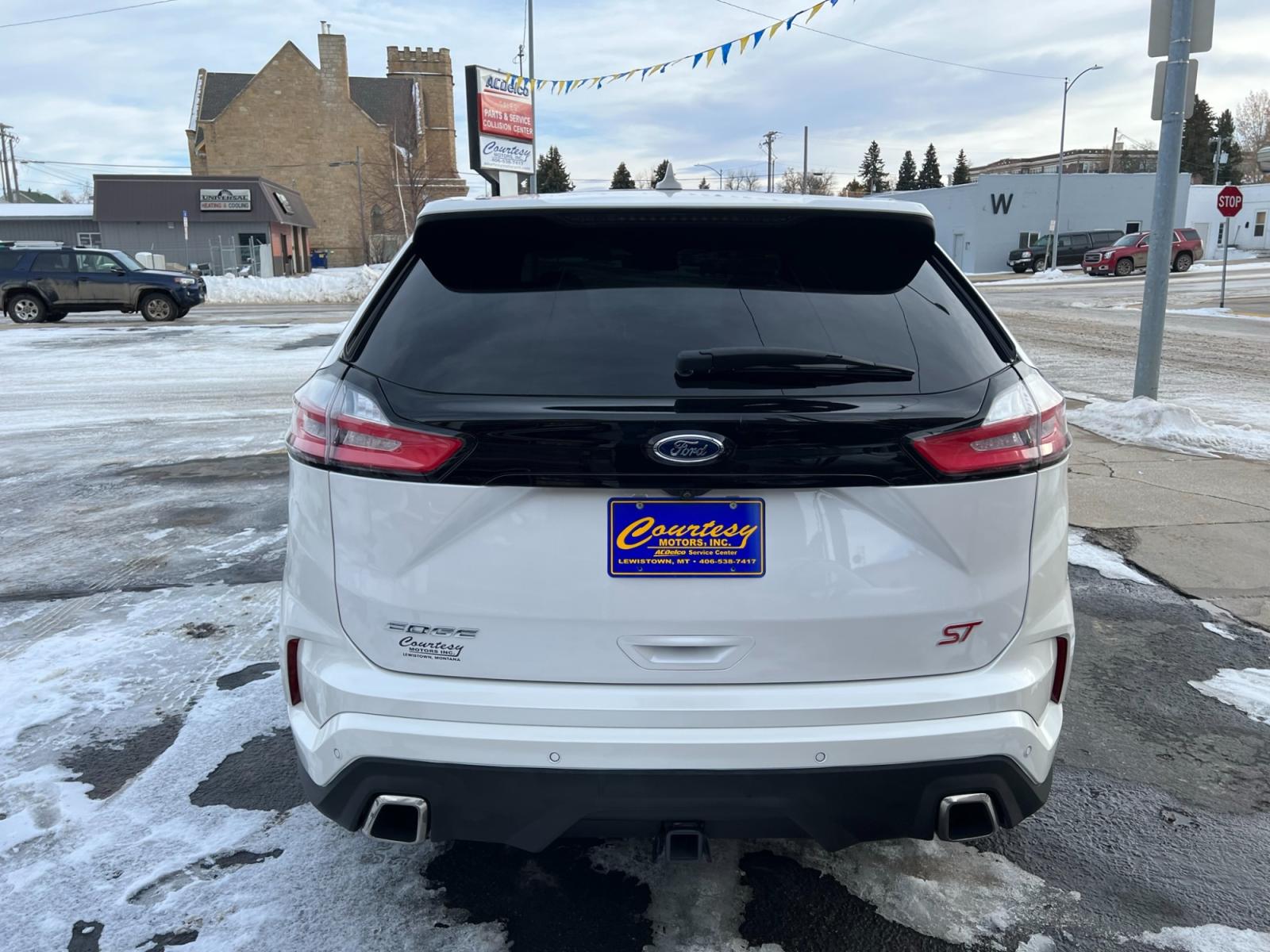 2019 WHITE /Black Ford Edge Sport AWD (2FMPK4AP7KB) with an 2.7L V6 DOCH 24V engine, 6A transmission, located at 116 5th Avenue South, Lewistown, MT, 59457, 47.063877, -109.427879 - Experience the perfect blend of power and luxury with the 2019 Ford Edge ST AWD. With a 2.7L engine and low miles, this vehicle will take you on a thrilling ride every time. The added convenience of a sunroof and a clean one-owner CarFax report make this SUV a must-have. Don't miss out on this incre - Photo #3