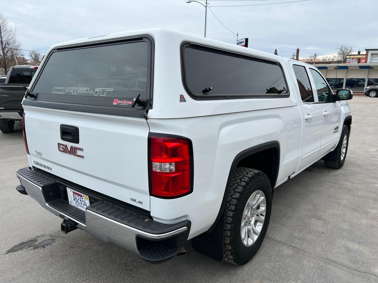 2018 WHITE /Grey GMC Sierra 1500 SLE Double Cab 4WD (1GTV2MEC9JZ) with an 5.3L V8 OHV 16V engine, 6A transmission, located at 116 5th Avenue South, Lewistown, MT, 59457, 47.063877, -109.427879 - Looking for a powerful and versatile pickup truck that can handle any job? Look no further than the 2018 GMC Sierra 1500 Double Cab SLE 4WD. With its rugged 4WD system and powerful V8 engine, the Sierra 1500 is the perfect choice for anyone looking to take on tough terrain and heavy loads. And wi - Photo #2