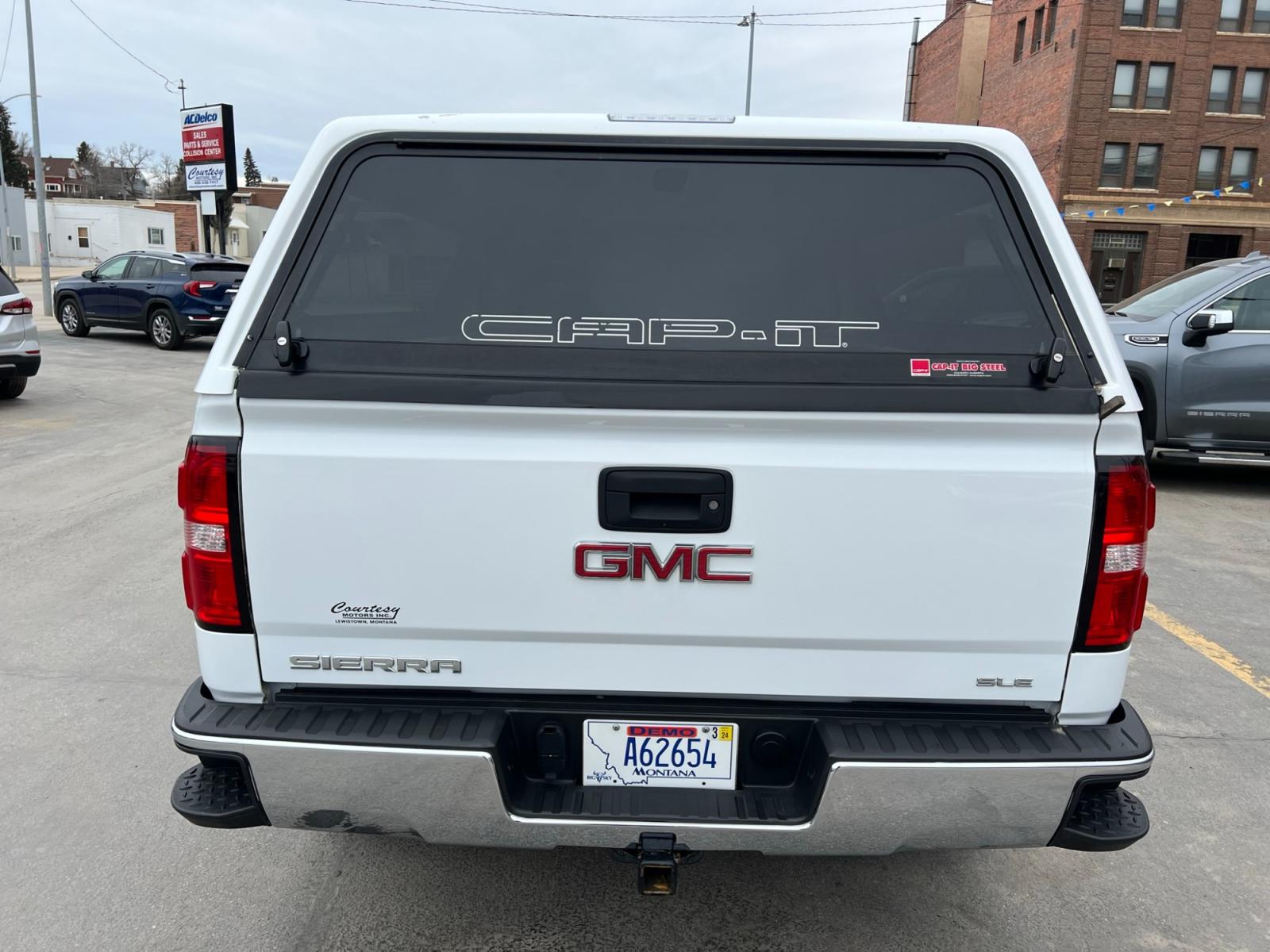 2018 WHITE /Grey GMC Sierra 1500 SLE Double Cab 4WD (1GTV2MEC9JZ) with an 5.3L V8 OHV 16V engine, 6A transmission, located at 116 5th Avenue South, Lewistown, MT, 59457, 47.063877, -109.427879 - Looking for a powerful and versatile pickup truck that can handle any job? Look no further than the 2018 GMC Sierra 1500 Double Cab SLE 4WD. With its rugged 4WD system and powerful V8 engine, the Sierra 1500 is the perfect choice for anyone looking to take on tough terrain and heavy loads. And wi - Photo #3