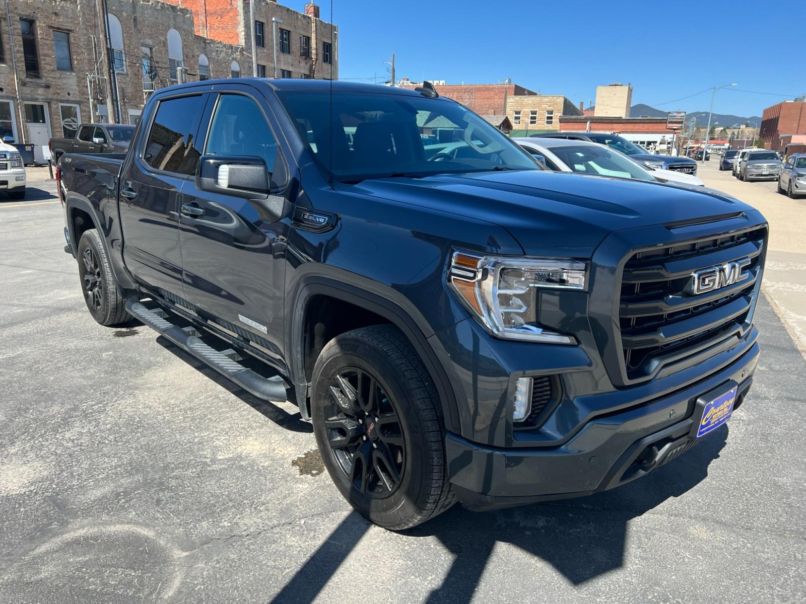 2021 Grey /Black GMC Sierra 1500 Elevation Crew Cab 4WD (3GTU9CED2MG) with an 5.3L V8 OHV 16V engine, 6A transmission, located at 116 5th Avenue South, Lewistown, MT, 59457, 47.063877, -109.427879 - Looking for a reliable and powerful pickup truck that can handle any job? Check out this 2021 GMC Sierra 1500 Crew Cab Elevation 4WD with only 6200 miles on the odometer! This truck has had only one owner and comes with a clean Carfax report, so you can be confident in its condition and performance - Photo #0