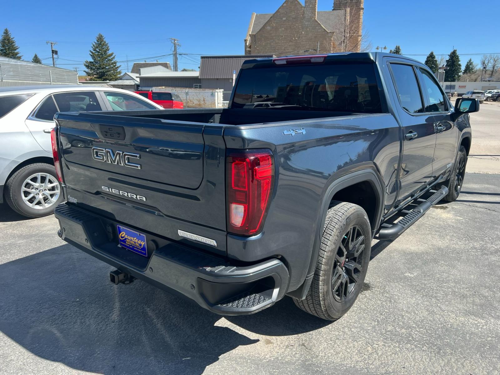 2021 Grey /Black GMC Sierra 1500 Elevation Crew Cab 4WD (3GTU9CED2MG) with an 5.3L V8 OHV 16V engine, 6A transmission, located at 116 5th Avenue South, Lewistown, MT, 59457, 47.063877, -109.427879 - Photo #4