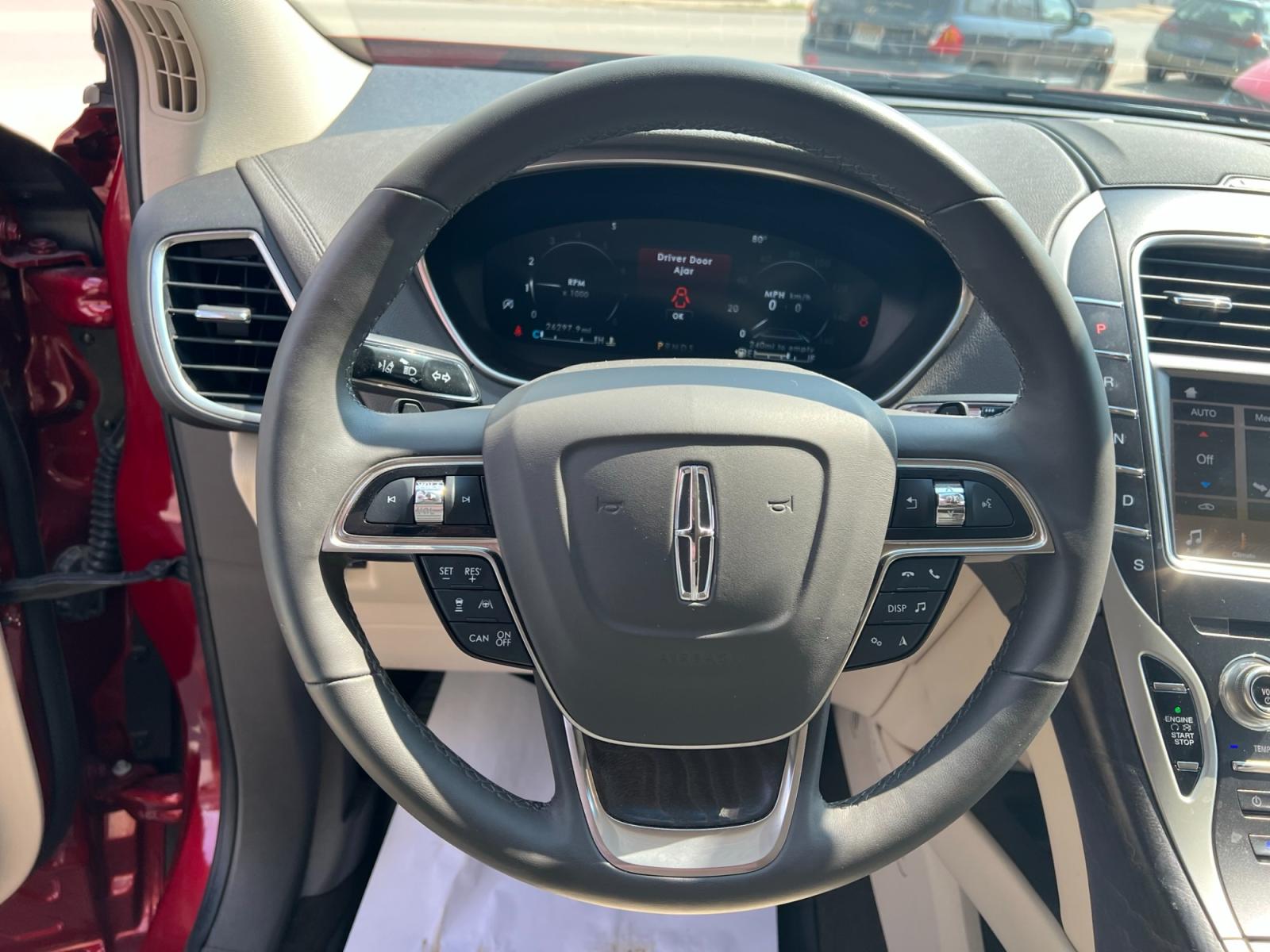 2019 Maroon /Cream Lincoln Nautilus Reserve AWD (2LMPJ8LP8KB) with an 2.7L V6 DOHC 24V engine, 6A transmission, located at 116 5th Avenue South, Lewistown, MT, 59457, 47.063877, -109.427879 - Looking for a luxurious and reliable SUV? Look no further! We present to you a stunning 2019 Lincoln Nautilus Reserve with incredibly low miles. This exceptional vehicle is a testament to Lincoln's commitment to craftsmanship and style. Don't miss out on this incredible opportunity to own a premium - Photo #18
