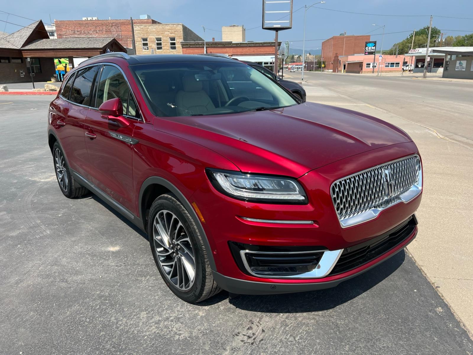 2019 Maroon /Cream Lincoln Nautilus Reserve AWD (2LMPJ8LP8KB) with an 2.7L V6 DOHC 24V engine, 6A transmission, located at 116 5th Avenue South, Lewistown, MT, 59457, 47.063877, -109.427879 - Looking for a luxurious and reliable SUV? Look no further! We present to you a stunning 2019 Lincoln Nautilus Reserve with incredibly low miles. This exceptional vehicle is a testament to Lincoln's commitment to craftsmanship and style. Don't miss out on this incredible opportunity to own a premium - Photo #1