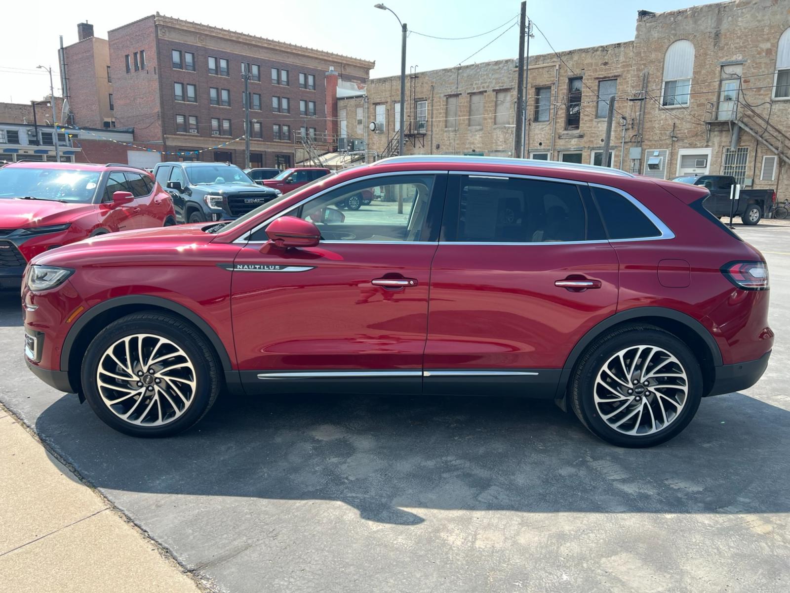 2019 Maroon /Cream Lincoln Nautilus Reserve AWD (2LMPJ8LP8KB) with an 2.7L V6 DOHC 24V engine, 6A transmission, located at 116 5th Avenue South, Lewistown, MT, 59457, 47.063877, -109.427879 - Looking for a luxurious and reliable SUV? Look no further! We present to you a stunning 2019 Lincoln Nautilus Reserve with incredibly low miles. This exceptional vehicle is a testament to Lincoln's commitment to craftsmanship and style. Don't miss out on this incredible opportunity to own a premium - Photo #5