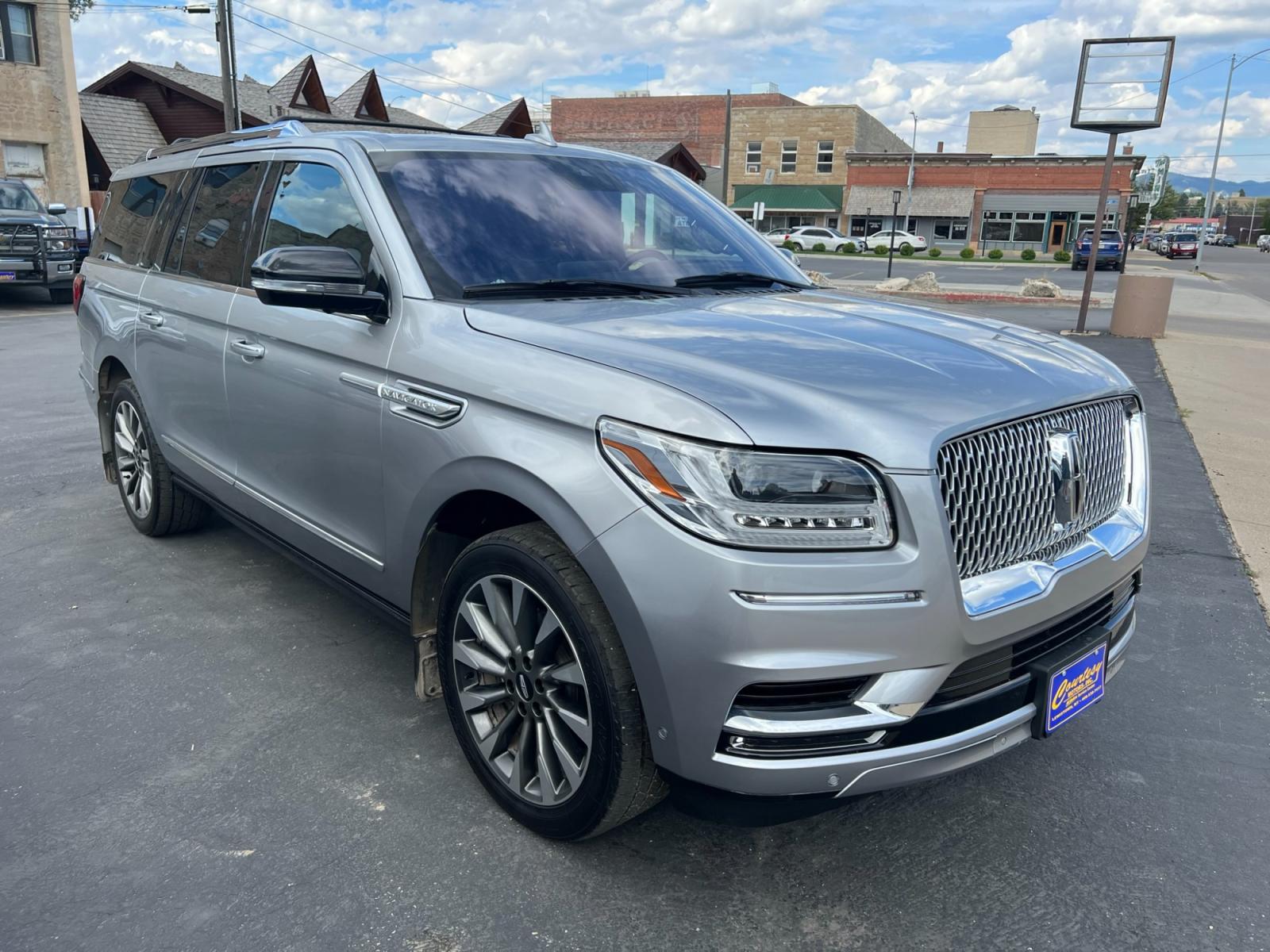 2020 SILVER /Black Lincoln Navigator L Reserve 4WD (5LMJJ3LT1LE) with an 3.5L V6 DOHC 24V FFV engine, 6A transmission, located at 116 5th Avenue South, Lewistown, MT, 59457, 47.063877, -109.427879 - Elevate your driving experience with the luxurious 2020 Lincoln Navigator L Reserve 4WD. This premium SUV seamlessly blends style, performance, and comfort to provide an unparalleled journey. Key Features: 1. Grand Space: Enjoy the expansive interior of the Navigator L, offering ample room for - Photo #0