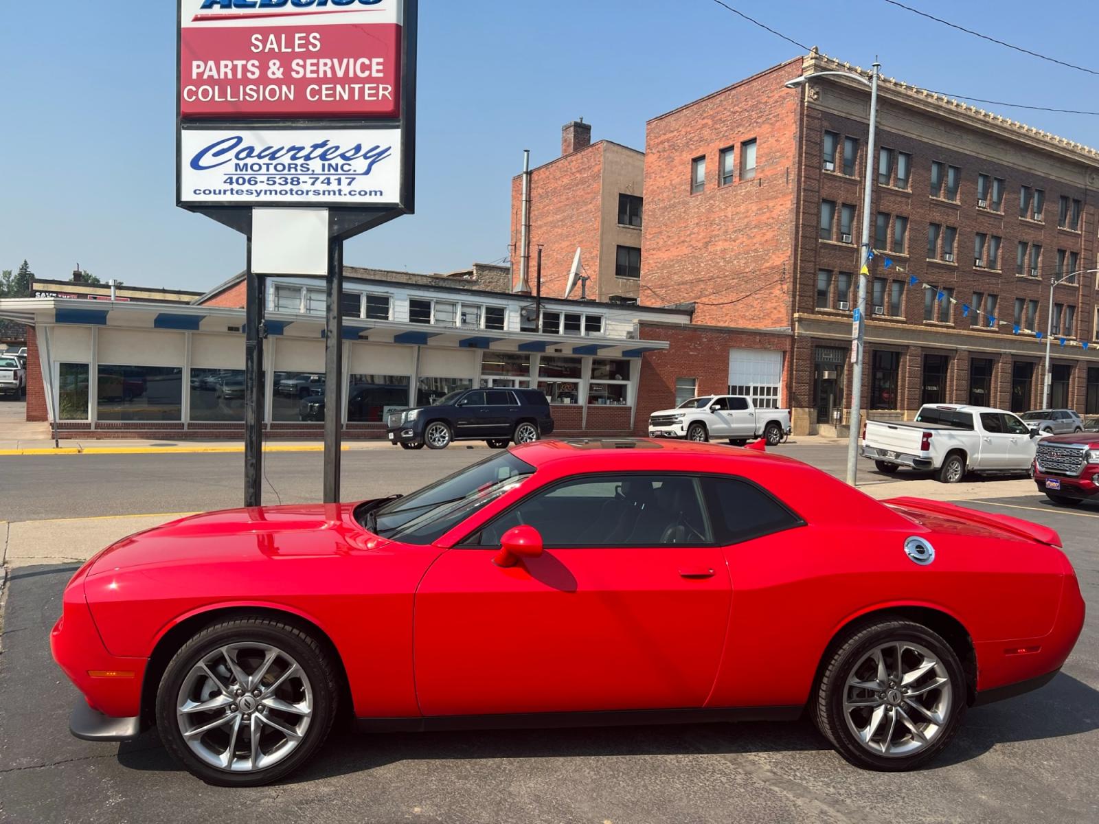 2021 Red /Black Dodge Challenger GT AWD (2C3CDZKG1MH) with an 3.6L V6 DOHC 24V engine, 8A transmission, located at 116 5th Avenue South, Lewistown, MT, 59457, 47.063877, -109.427879 - Experience pure driving excitement with the 2021 Dodge Challenger GT AWD. Dominate the road with its fierce V6 engine, delivering an exhilarating performance that will leave you breathless. Feel the rush as you seamlessly grip the pavement with the advanced all-wheel-drive system, ensuring control a - Photo #1