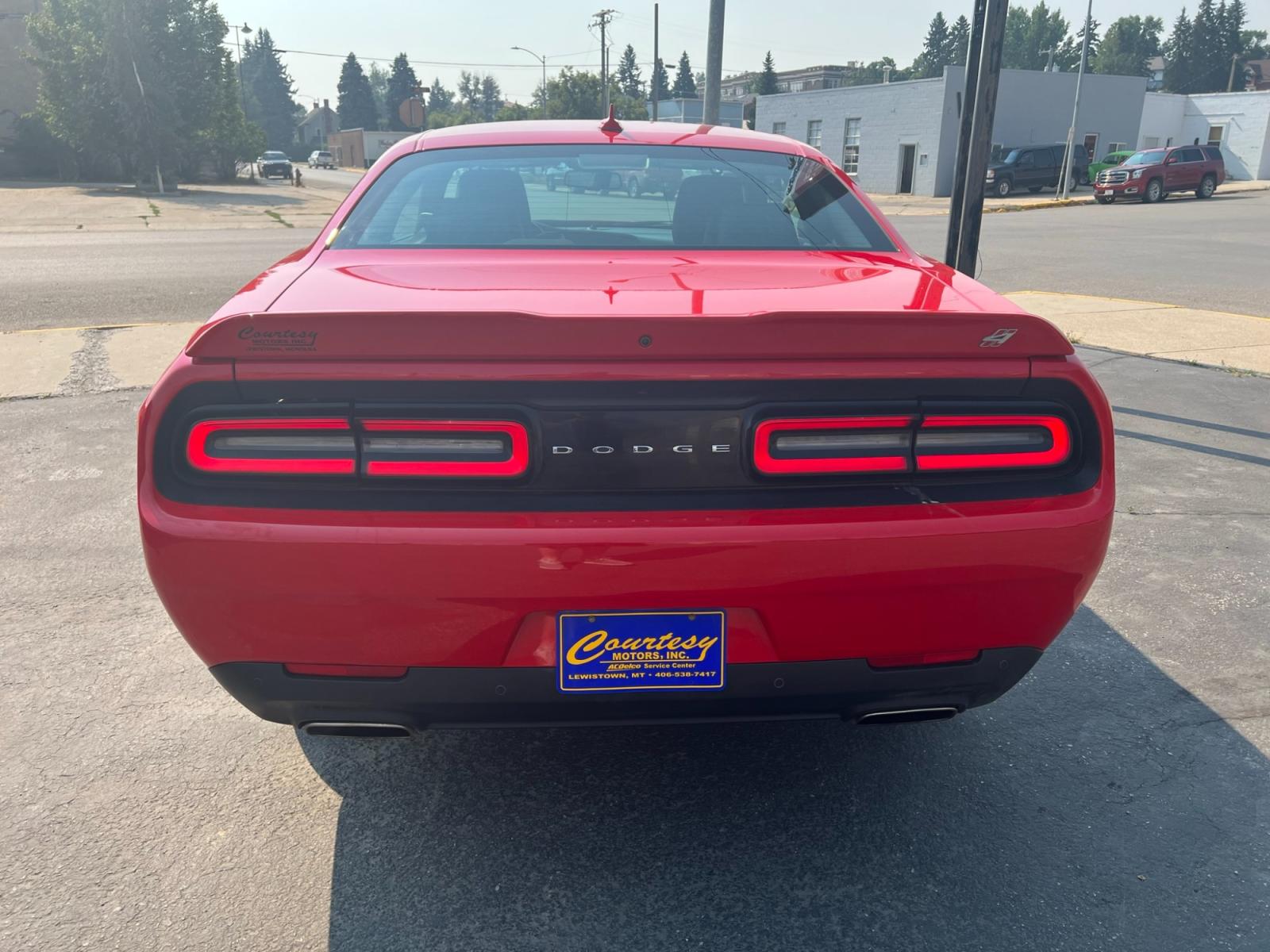 2021 Red /Black Dodge Challenger GT AWD (2C3CDZKG1MH) with an 3.6L V6 DOHC 24V engine, 8A transmission, located at 116 5th Avenue South, Lewistown, MT, 59457, 47.063877, -109.427879 - Experience pure driving excitement with the 2021 Dodge Challenger GT AWD. Dominate the road with its fierce V6 engine, delivering an exhilarating performance that will leave you breathless. Feel the rush as you seamlessly grip the pavement with the advanced all-wheel-drive system, ensuring control a - Photo #3