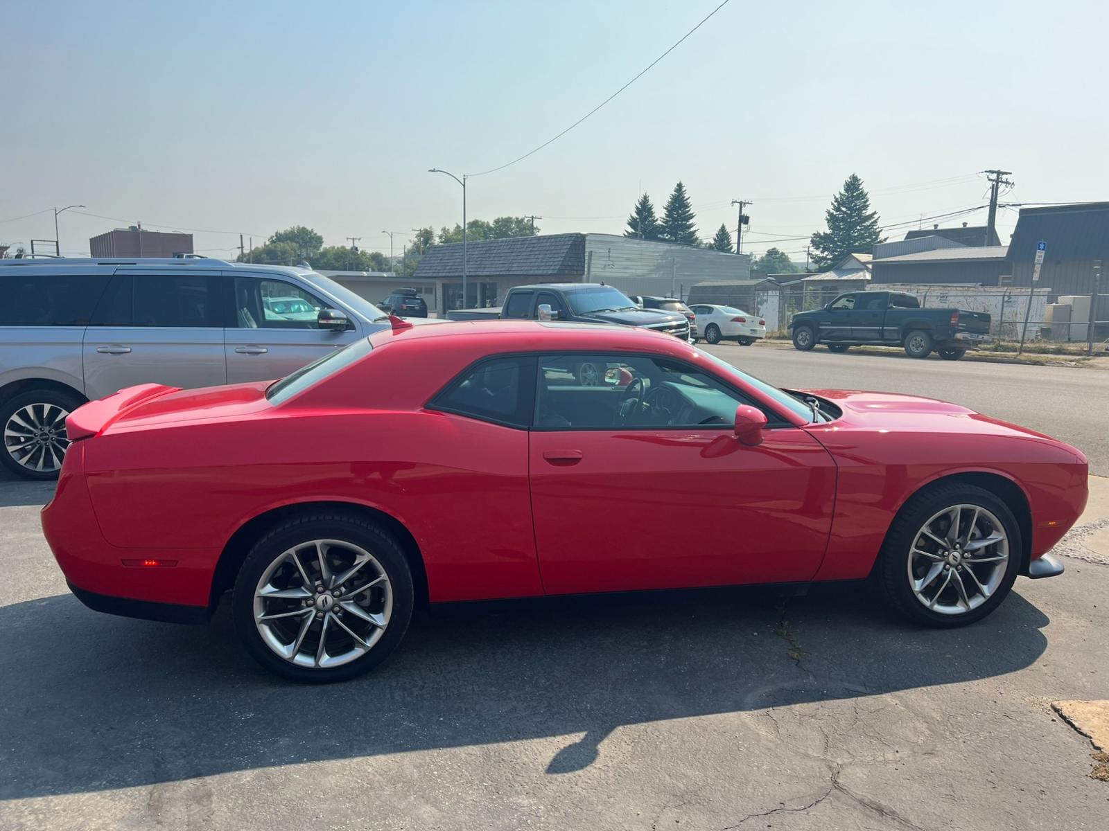 2021 Red /Black Dodge Challenger GT AWD (2C3CDZKG1MH) with an 3.6L V6 DOHC 24V engine, 8A transmission, located at 116 5th Avenue South, Lewistown, MT, 59457, 47.063877, -109.427879 - Experience pure driving excitement with the 2021 Dodge Challenger GT AWD. Dominate the road with its fierce V6 engine, delivering an exhilarating performance that will leave you breathless. Feel the rush as you seamlessly grip the pavement with the advanced all-wheel-drive system, ensuring control a - Photo #5