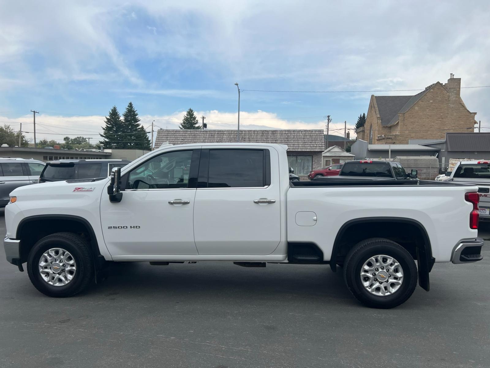 2022 WHITE /Black Chevrolet Silverado 2500HD LTZ Crew Cab Short Box 4WD (2GC4YPE72N1) with an 6.6L V8 OHV 16V engine, 6A transmission, located at 116 5th Avenue South, Lewistown, MT, 59457, 47.063877, -109.427879 - Introducing the 2022 Silverado 2500HD Crew Cab Short Box LTZ 4WD! Key Features: Heavy-Duty 6.6L V8 Engine 4WD Capability for Any Terrain Spacious Crew Cab for Comfort Short Box for Versatile Hauling LTZ Trim for Premium Style Advanced Technology Integration Towing and Hauling Confidence - Photo #1