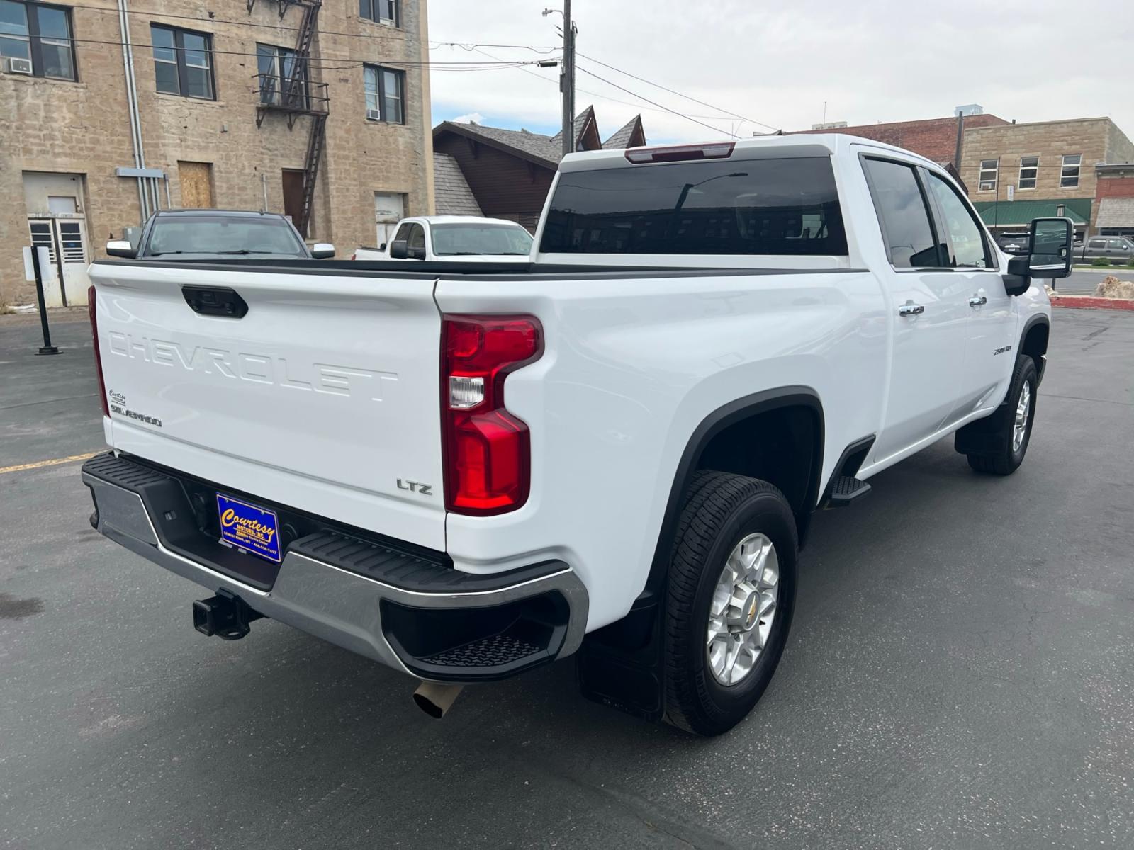 2022 WHITE /Black Chevrolet Silverado 2500HD LTZ Crew Cab Short Box 4WD (2GC4YPE72N1) with an 6.6L V8 OHV 16V engine, 6A transmission, located at 116 5th Avenue South, Lewistown, MT, 59457, 47.063877, -109.427879 - Introducing the 2022 Silverado 2500HD Crew Cab Short Box LTZ 4WD! Key Features: Heavy-Duty 6.6L V8 Engine 4WD Capability for Any Terrain Spacious Crew Cab for Comfort Short Box for Versatile Hauling LTZ Trim for Premium Style Advanced Technology Integration Towing and Hauling Confidence - Photo #4