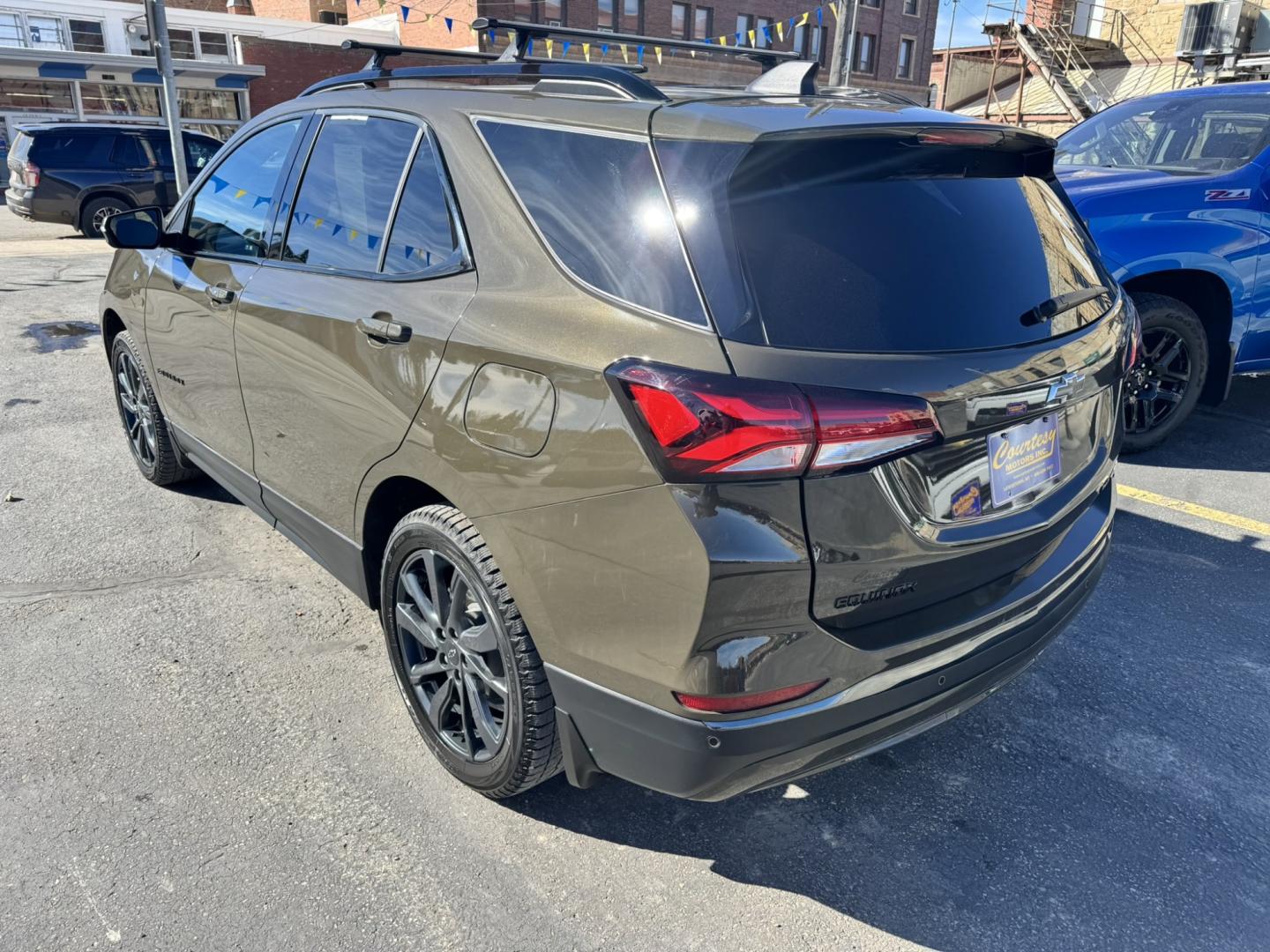 2023 Green /Black Chevrolet Equinox RS (3GNAXWEG1PL) with an 2.0L SIDI I4 TURBO ENGINE engine, Automatic transmission, located at 116 5th Avenue South, Lewistown, MT, 59457, 47.063877, -109.427879 - Experience the perfect blend of style, performance, and technology with the 2023 Chevy Equinox RS AWD. This versatile SUV offers a sleek, modern design that stands out on the road, combined with the reliability and power you expect from Chevrolet. The RS trim features sporty accents and a distinctiv- Photo#3