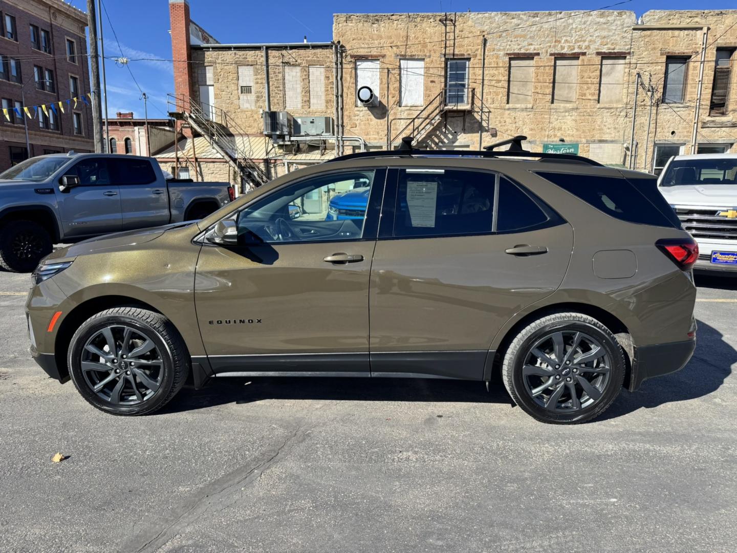 2023 Green /Black Chevrolet Equinox RS (3GNAXWEG1PL) with an 2.0L SIDI I4 TURBO ENGINE engine, Automatic transmission, located at 116 5th Avenue South, Lewistown, MT, 59457, 47.063877, -109.427879 - Experience the perfect blend of style, performance, and technology with the 2023 Chevy Equinox RS AWD. This versatile SUV offers a sleek, modern design that stands out on the road, combined with the reliability and power you expect from Chevrolet. The RS trim features sporty accents and a distinctiv- Photo#4