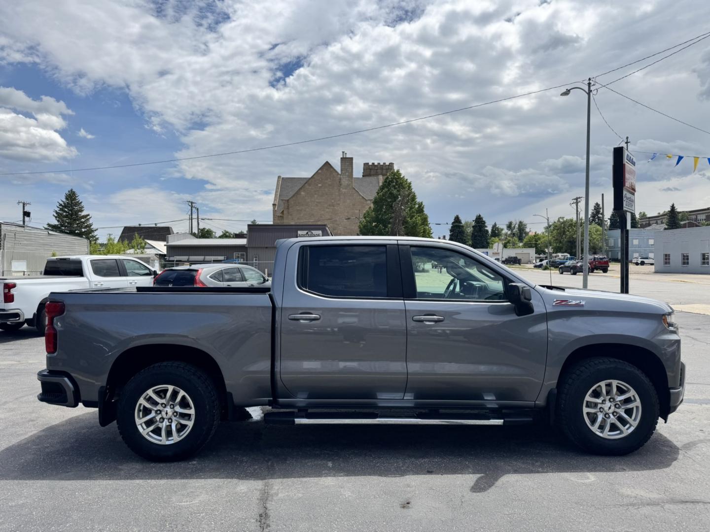 2021 Blue /Charcoal Chevrolet Silverado 1500 RST Crew Cab 4WD (1GCUYEED4MZ) with an 5.3L V8 OHV 16V engine, 6A transmission, located at 116 5th Avenue South, Lewistown, MT, 59457, 47.063877, -109.427879 - Take on any road with confidence in this 2021 Chevrolet Silverado 1500 RST 4WD, a perfect combination of power, style, and capability. Equipped with a 5.3L V8 engine, this truck delivers impressive performance and towing capacity, making it ideal for work or weekend adventures. The RST trim adds a b- Photo#1