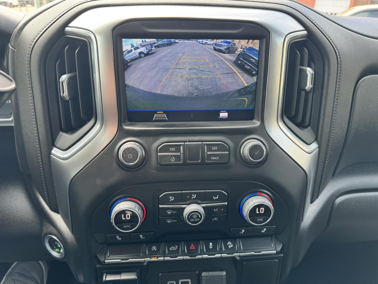 2021 Blue /Charcoal Chevrolet Silverado 1500 RST Crew Cab 4WD (1GCUYEED4MZ) with an 5.3L V8 OHV 16V engine, 6A transmission, located at 116 5th Avenue South, Lewistown, MT, 59457, 47.063877, -109.427879 - Take on any road with confidence in this 2021 Chevrolet Silverado 1500 RST 4WD, a perfect combination of power, style, and capability. Equipped with a 5.3L V8 engine, this truck delivers impressive performance and towing capacity, making it ideal for work or weekend adventures. The RST trim adds a b- Photo#19
