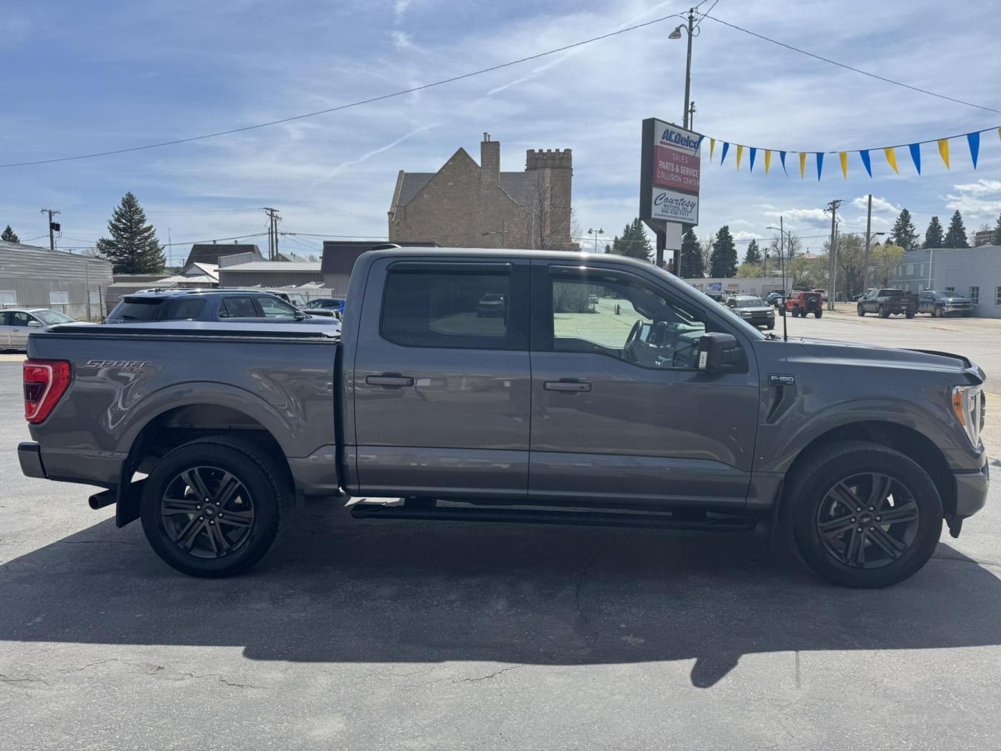 2022 Grey /Black Ford F-150 XLT Sport SuperCrew 6.5-ft. Bed 4WD (1FTFW1E80NK) with an 3.5L V6 DOHC 24V engine, 6A transmission, located at 116 5th Avenue South, Lewistown, MT, 59457, 47.063877, -109.427879 - For Sale: 2022 Ford F-150 SuperCrew XLT 4x4 – This one-owner, low-mileage local trade is equipped with the powerful 3.5L EcoBoost engine, delivering excellent performance and towing capability. It features the Sport Appearance Package for a bold, aggressive look, along with a factory trailer tow p - Photo#1
