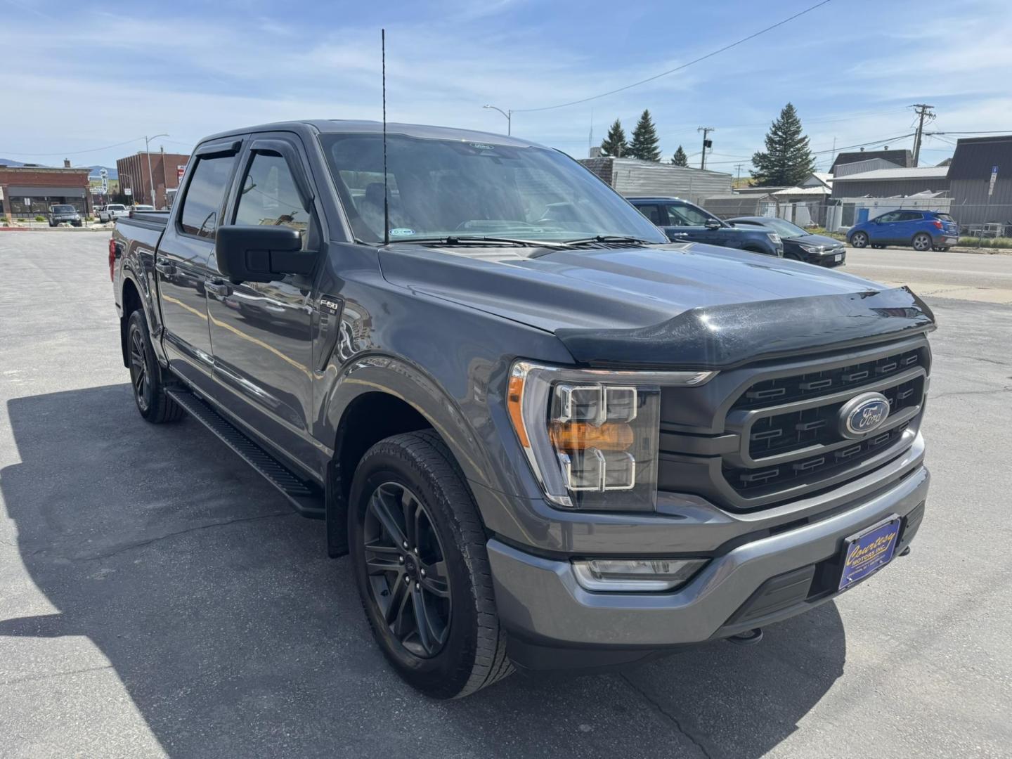 2022 Grey /Black Ford F-150 XLT Sport SuperCrew 6.5-ft. Bed 4WD (1FTFW1E80NK) with an 3.5L V6 DOHC 24V engine, 6A transmission, located at 116 5th Avenue South, Lewistown, MT, 59457, 47.063877, -109.427879 - For Sale: 2022 Ford F-150 SuperCrew XLT 4x4 – This one-owner, low-mileage local trade is equipped with the powerful 3.5L EcoBoost engine, delivering excellent performance and towing capability. It features the Sport Appearance Package for a bold, aggressive look, along with a factory trailer tow p - Photo#0