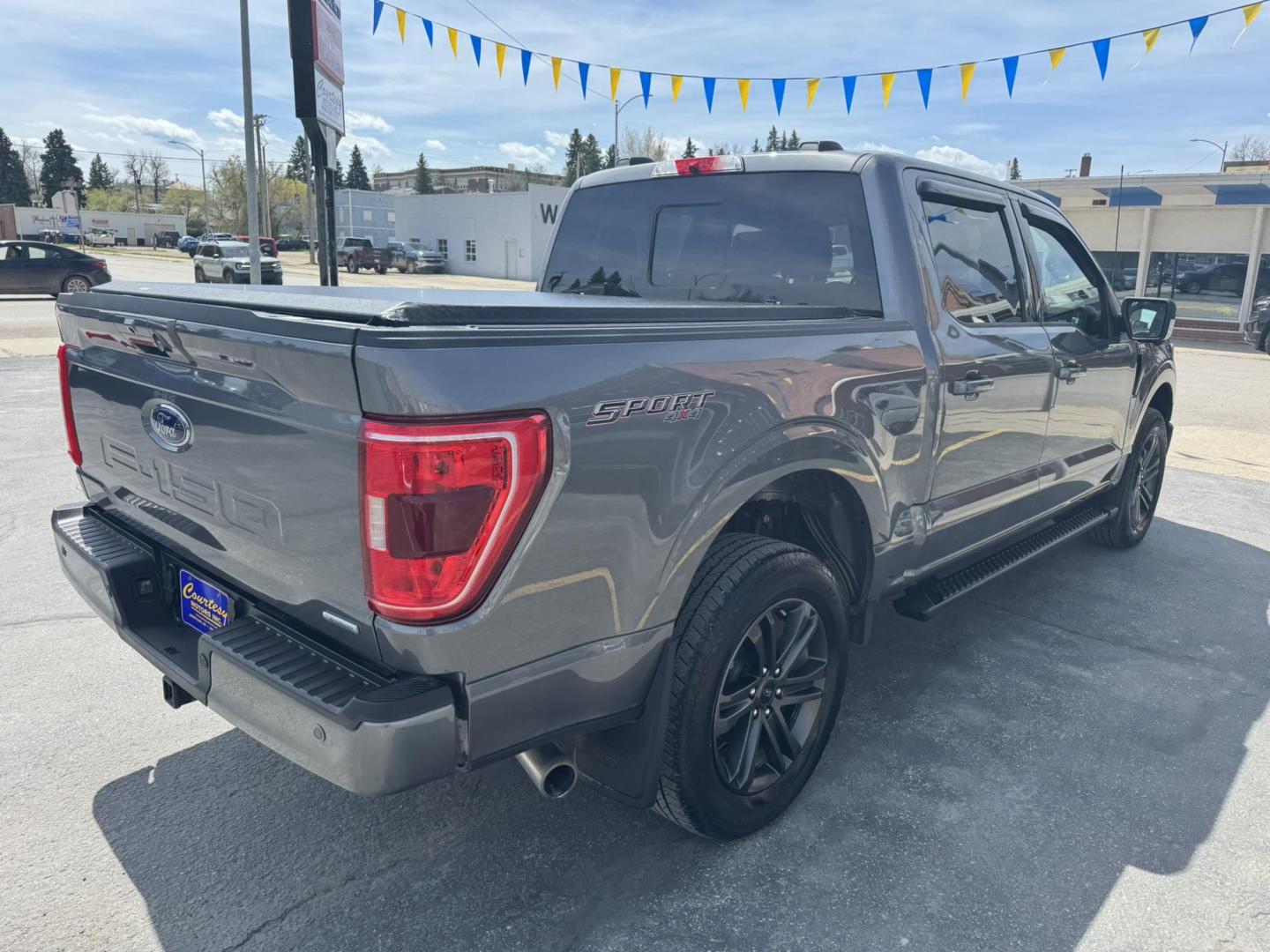 2022 Grey /Black Ford F-150 XLT Sport SuperCrew 6.5-ft. Bed 4WD (1FTFW1E80NK) with an 3.5L V6 DOHC 24V engine, 6A transmission, located at 116 5th Avenue South, Lewistown, MT, 59457, 47.063877, -109.427879 - For Sale: 2022 Ford F-150 SuperCrew XLT 4x4 – This one-owner, low-mileage local trade is equipped with the powerful 3.5L EcoBoost engine, delivering excellent performance and towing capability. It features the Sport Appearance Package for a bold, aggressive look, along with a factory trailer tow p - Photo#2