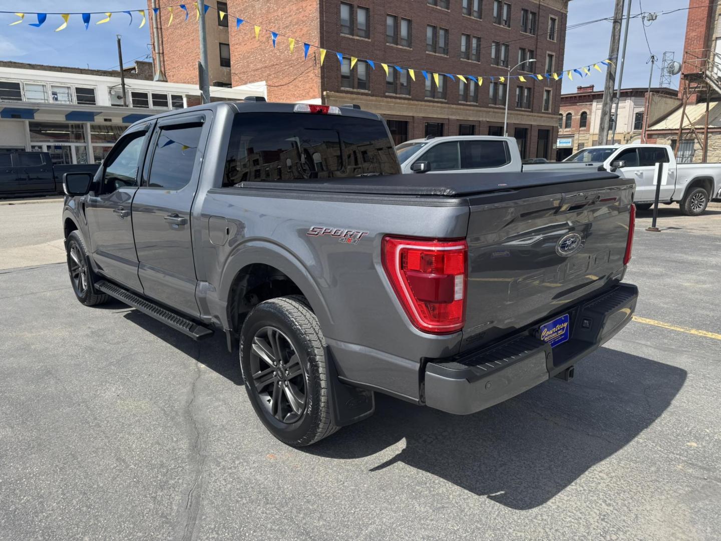 2022 Grey /Black Ford F-150 XLT Sport SuperCrew 6.5-ft. Bed 4WD (1FTFW1E80NK) with an 3.5L V6 DOHC 24V engine, 6A transmission, located at 116 5th Avenue South, Lewistown, MT, 59457, 47.063877, -109.427879 - For Sale: 2022 Ford F-150 SuperCrew XLT 4x4 – This one-owner, low-mileage local trade is equipped with the powerful 3.5L EcoBoost engine, delivering excellent performance and towing capability. It features the Sport Appearance Package for a bold, aggressive look, along with a factory trailer tow p - Photo#4