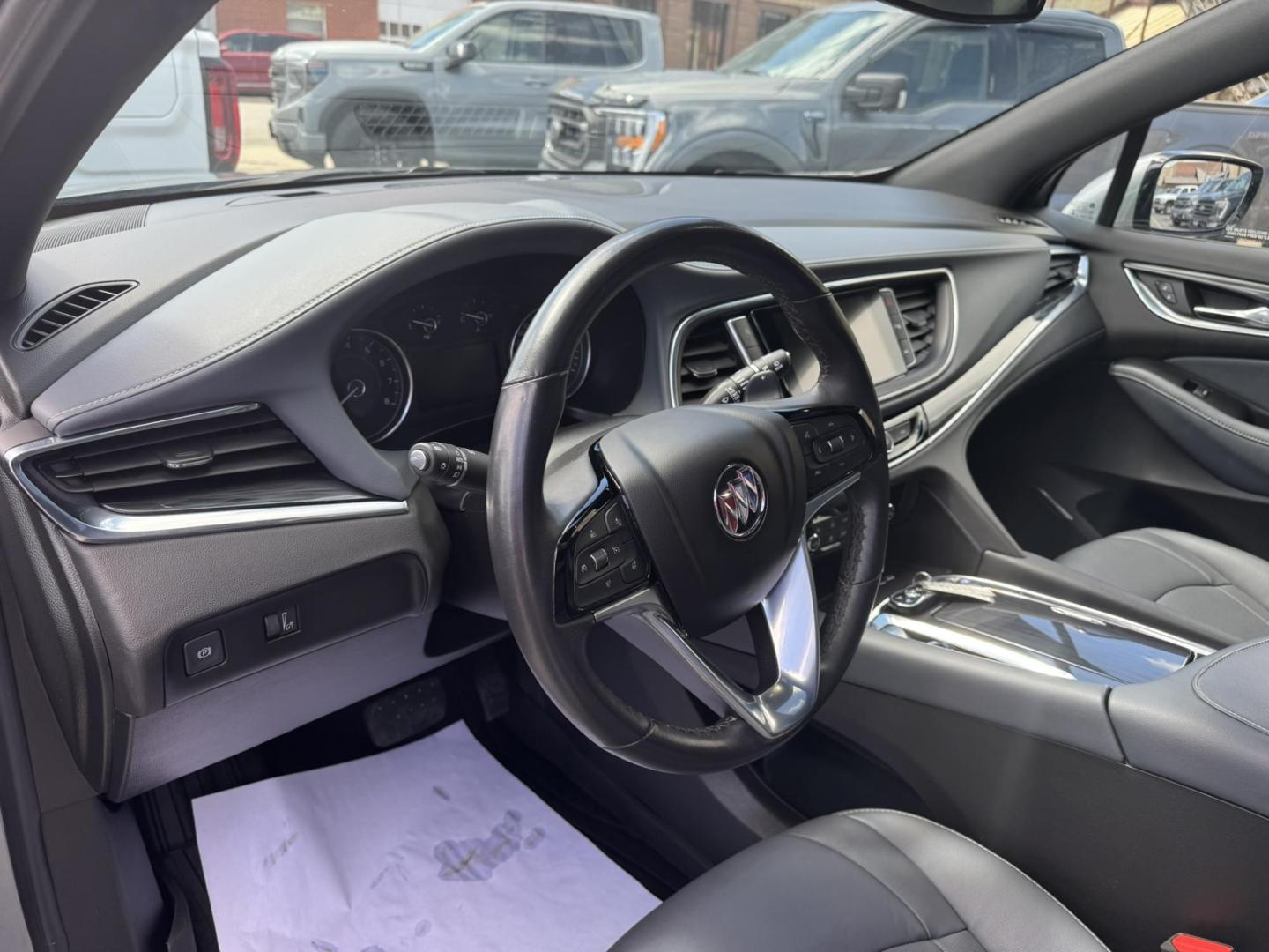 2023 Grey /Grey Buick Enclave Essence AWD (5GAEVAKW8PJ) with an 3.6L V6 DOHC 24V engine, 9A transmission, located at 116 5th Avenue South, Lewistown, MT, 59457, 47.063877, -109.427879 - For sale: 2023 Buick Enclave Essence AWD — a perfect blend of luxury, performance, and practicality. This premium midsize SUV offers a smooth, quiet ride with confident all-wheel drive handling, ideal for all seasons. Powered by a robust 3.6L V6 engine, it delivers strong performance while maintai - Photo#16
