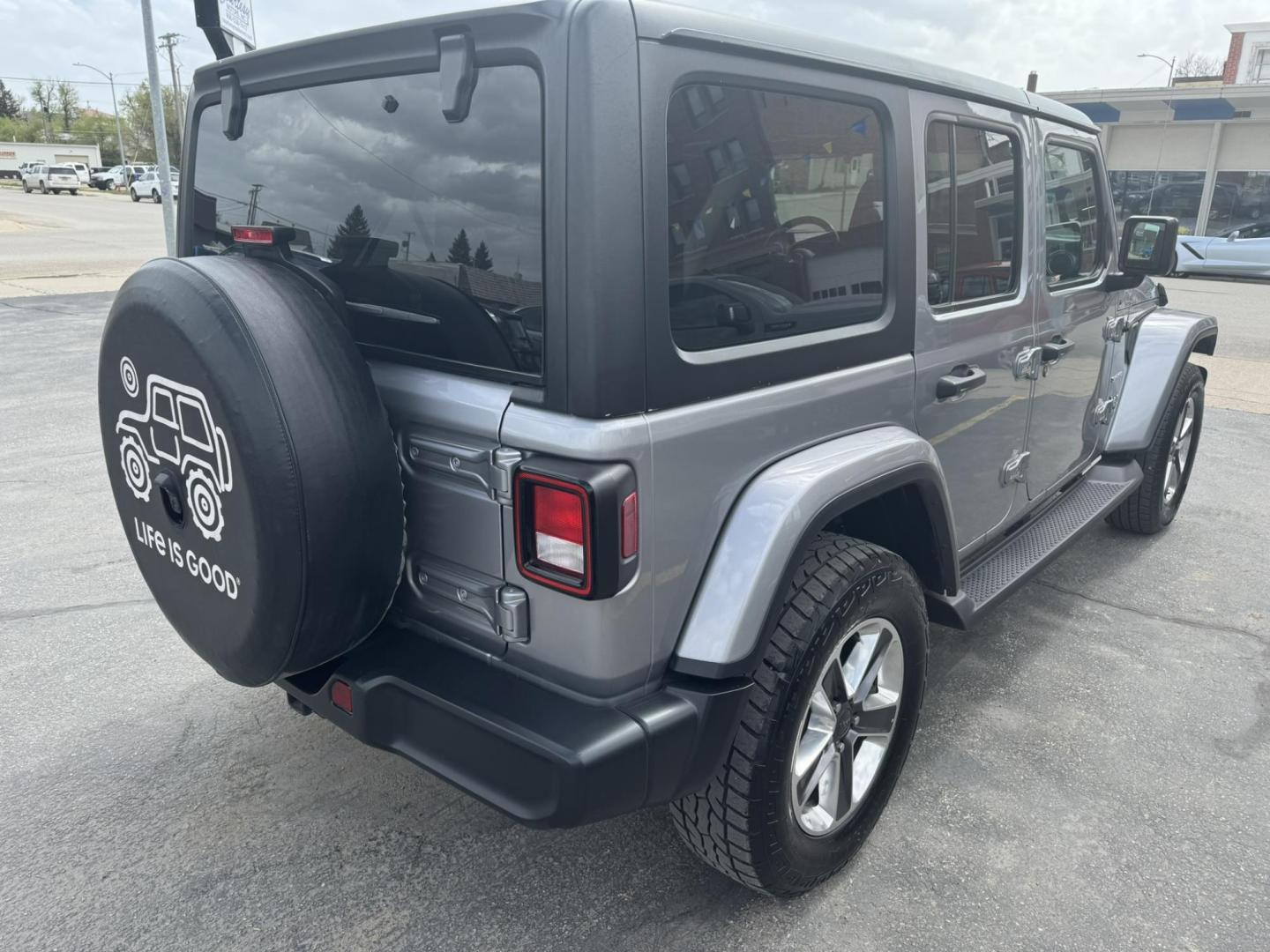 2021 Silver /Charcoal Jeep Wrangler Unlimited Sahara (1C4HJXEN3MW) with an 2.0L L4 DOHC 16V TURBO engine, 8A transmission, located at 116 5th Avenue South, Lewistown, MT, 59457, 47.063877, -109.427879 - Available now: 2021 Jeep Wrangler Sahara — a perfect blend of rugged capability and refined comfort. Powered by Jeep’s 2.0L Turbocharged engine, this two-door SUV delivers impressive torque and efficiency while maintaining the legendary off-road performance Jeep is known for. The Sahara trim add - Photo#2