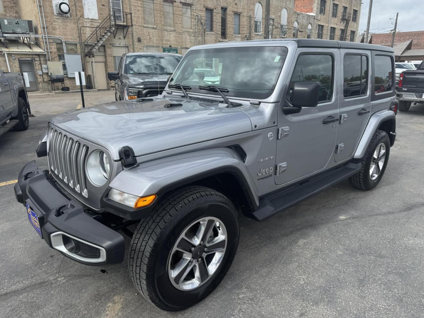 2021 Silver /Charcoal Jeep Wrangler Unlimited Sahara (1C4HJXEN3MW) with an 2.0L L4 DOHC 16V TURBO engine, 8A transmission, located at 116 5th Avenue South, Lewistown, MT, 59457, 47.063877, -109.427879 - Available now: 2021 Jeep Wrangler Sahara — a perfect blend of rugged capability and refined comfort. Powered by Jeep’s 2.0L Turbocharged engine, this two-door SUV delivers impressive torque and efficiency while maintaining the legendary off-road performance Jeep is known for. The Sahara trim add - Photo#6
