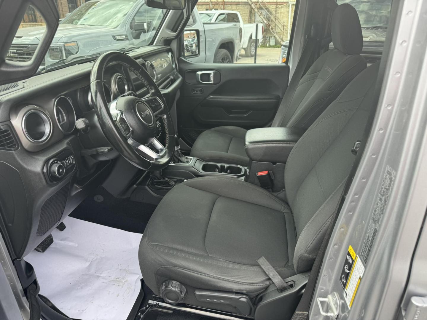 2021 Silver /Charcoal Jeep Wrangler Unlimited Sahara (1C4HJXEN3MW) with an 2.0L L4 DOHC 16V TURBO engine, 8A transmission, located at 116 5th Avenue South, Lewistown, MT, 59457, 47.063877, -109.427879 - Available now: 2021 Jeep Wrangler Sahara — a perfect blend of rugged capability and refined comfort. Powered by Jeep’s 2.0L Turbocharged engine, this two-door SUV delivers impressive torque and efficiency while maintaining the legendary off-road performance Jeep is known for. The Sahara trim add - Photo#11