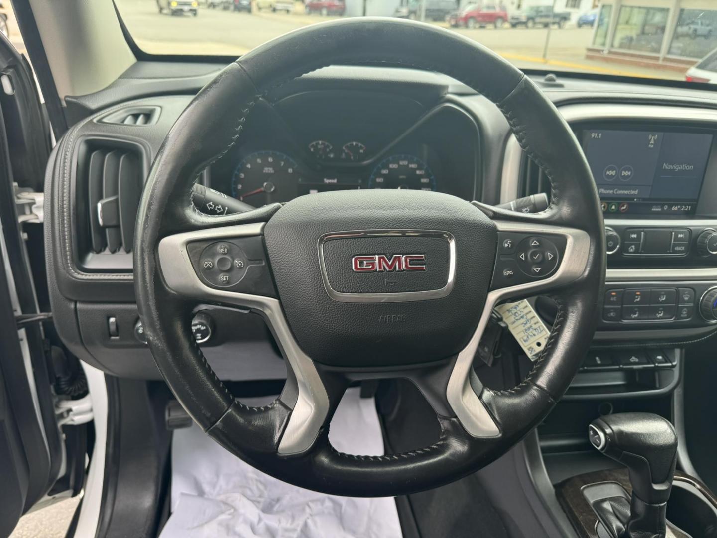 2021 WHITE /Black GMC Canyon Elevation Crew Cab 4WD (1GTG6CEN1M1) with an 3.6L V6 DOHC 24V engine, 6A transmission, located at 116 5th Avenue South, Lewistown, MT, 59457, 47.063877, -109.427879 - Stand out on the road and off it with this sharp 2021 GMC Canyon Elevation. This midsize truck brings rugged capability, modern tech, and head-turning style in a versatile package perfect for work or play. Powered by a responsive engine and equipped with 4WD, it’s ready for all-season traction and - Photo#13