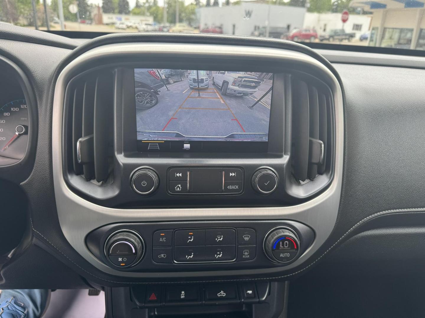 2021 WHITE /Black GMC Canyon Elevation Crew Cab 4WD (1GTG6CEN1M1) with an 3.6L V6 DOHC 24V engine, 6A transmission, located at 116 5th Avenue South, Lewistown, MT, 59457, 47.063877, -109.427879 - Stand out on the road and off it with this sharp 2021 GMC Canyon Elevation. This midsize truck brings rugged capability, modern tech, and head-turning style in a versatile package perfect for work or play. Powered by a responsive engine and equipped with 4WD, it’s ready for all-season traction and - Photo#14