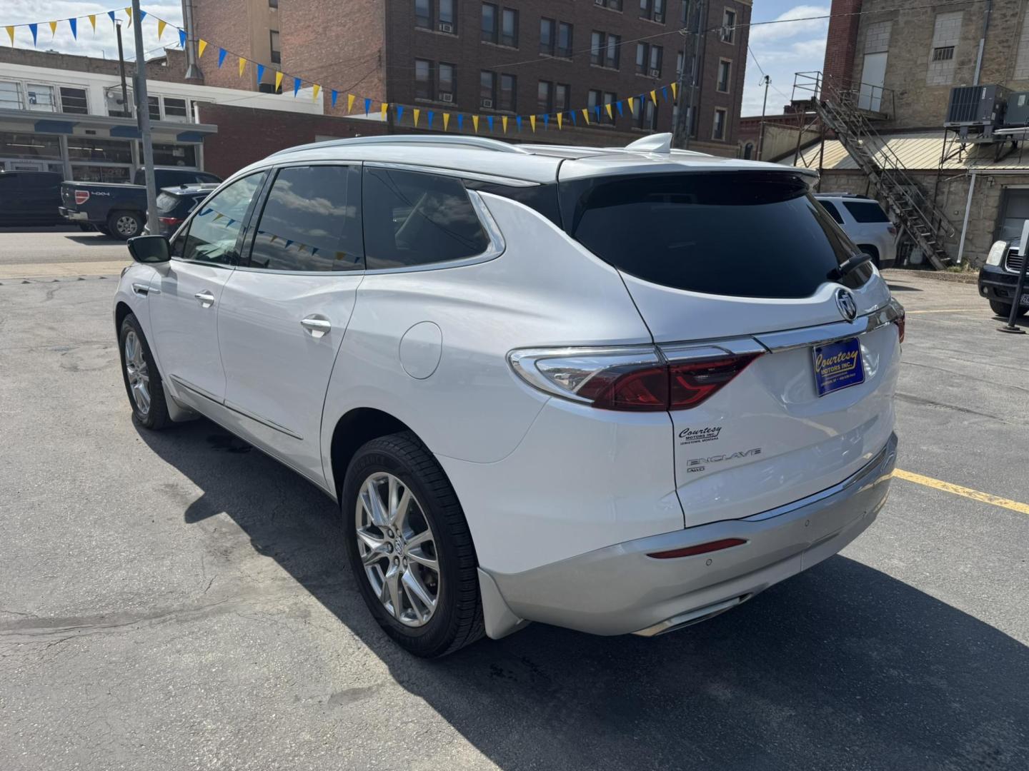 2023 WHITE /Cream Buick Enclave Premium AWD (5GAEVBKW6PJ) with an 3.6L V6 DOHC 24V engine, 9A transmission, located at 116 5th Avenue South, Lewistown, MT, 59457, 47.063877, -109.427879 - 2023 Buick Enclave Premium AWD Refined luxury meets everyday versatility in this 2023 Buick Enclave Premium AWD. With sleek styling, premium materials, and a smooth, confident ride, this full-size SUV is built to elevate your family’s driving experience. Equipped with All-Wheel Drive for enhance - Photo#4