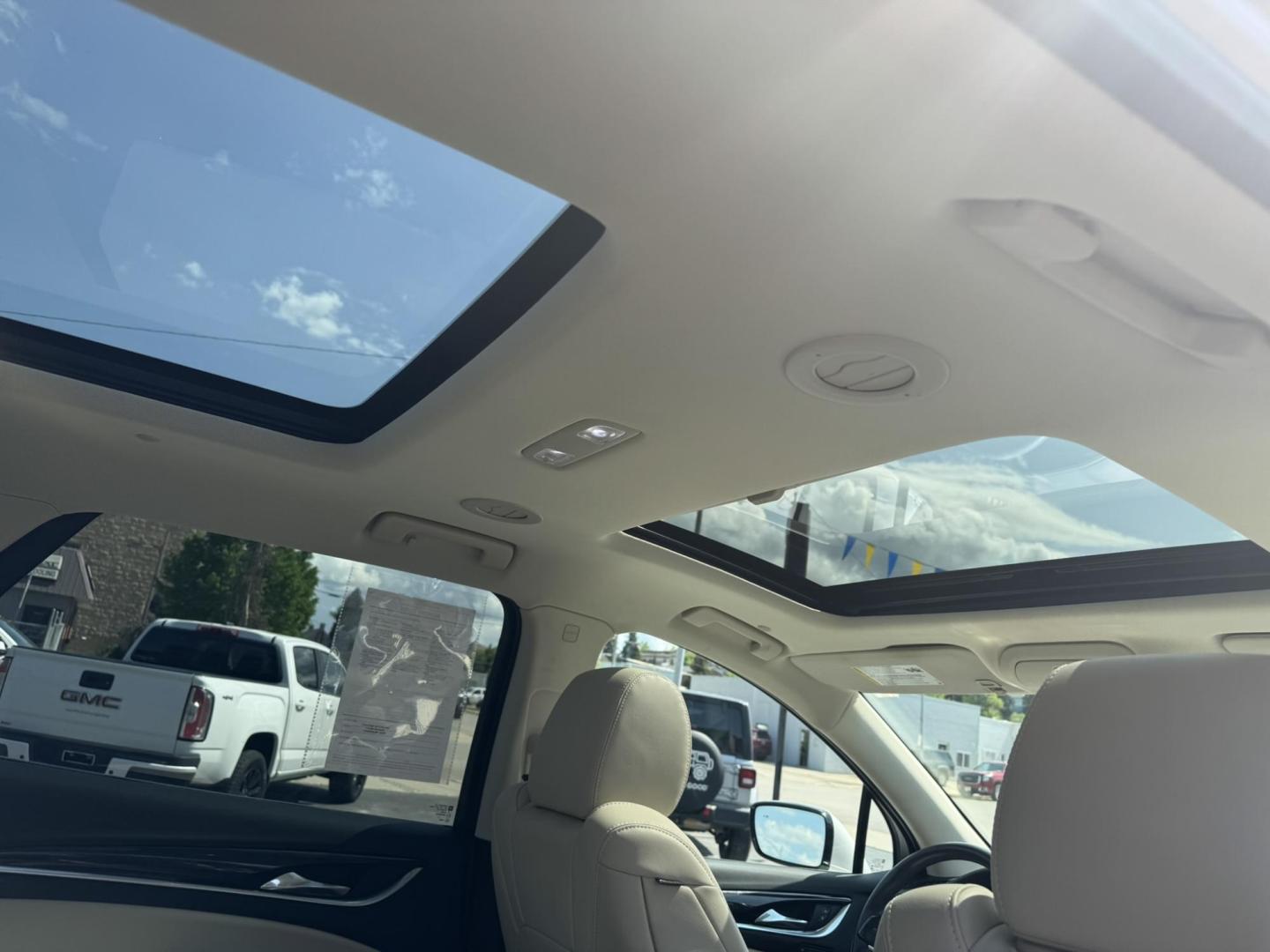 2023 WHITE /Cream Buick Enclave Premium AWD (5GAEVBKW6PJ) with an 3.6L V6 DOHC 24V engine, 9A transmission, located at 116 5th Avenue South, Lewistown, MT, 59457, 47.063877, -109.427879 - 2023 Buick Enclave Premium AWD Refined luxury meets everyday versatility in this 2023 Buick Enclave Premium AWD. With sleek styling, premium materials, and a smooth, confident ride, this full-size SUV is built to elevate your family’s driving experience. Equipped with All-Wheel Drive for enhance - Photo#9