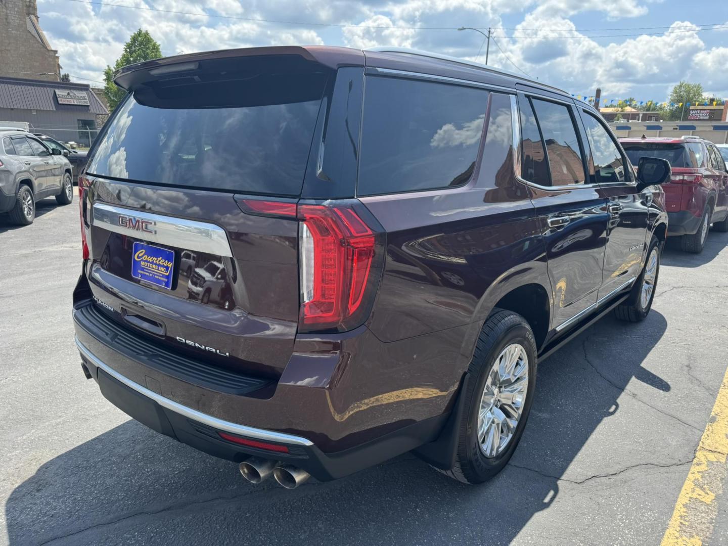 2022 Dark Bronze /Black GMC Yukon Denali 4WD (1GKS2DKL0NR) with an 6.2L V8 OHV 16V engine, 10A transmission, located at 116 5th Avenue South, Lewistown, MT, 59457, 47.063877, -109.427879 - For sale is a 2022 GMC Yukon Denali 4WD powered by the legendary 6.2L V8 engine paired with a 10-speed automatic transmission. This full-size SUV delivers 420 horsepower and 460 lb-ft of torque, offering impressive towing capability and smooth, confident performance in all driving conditions. The D - Photo#2
