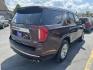 2022 Dark Bronze /Black GMC Yukon Denali 4WD (1GKS2DKL0NR) with an 6.2L V8 OHV 16V engine, 10A transmission, located at 116 5th Avenue South, Lewistown, MT, 59457, 47.063877, -109.427879 - For sale is a 2022 GMC Yukon Denali 4WD powered by the legendary 6.2L V8 engine paired with a 10-speed automatic transmission. This full-size SUV delivers 420 horsepower and 460 lb-ft of torque, offering impressive towing capability and smooth, confident performance in all driving conditions. The D - Photo#2