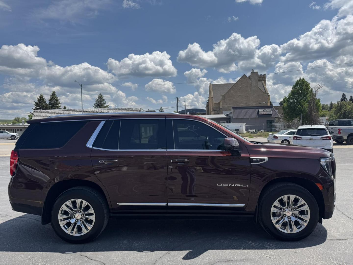 2022 Dark Bronze /Black GMC Yukon Denali 4WD (1GKS2DKL0NR) with an 6.2L V8 OHV 16V engine, 10A transmission, located at 116 5th Avenue South, Lewistown, MT, 59457, 47.063877, -109.427879 - For sale is a 2022 GMC Yukon Denali 4WD powered by the legendary 6.2L V8 engine paired with a 10-speed automatic transmission. This full-size SUV delivers 420 horsepower and 460 lb-ft of torque, offering impressive towing capability and smooth, confident performance in all driving conditions. The D - Photo#1