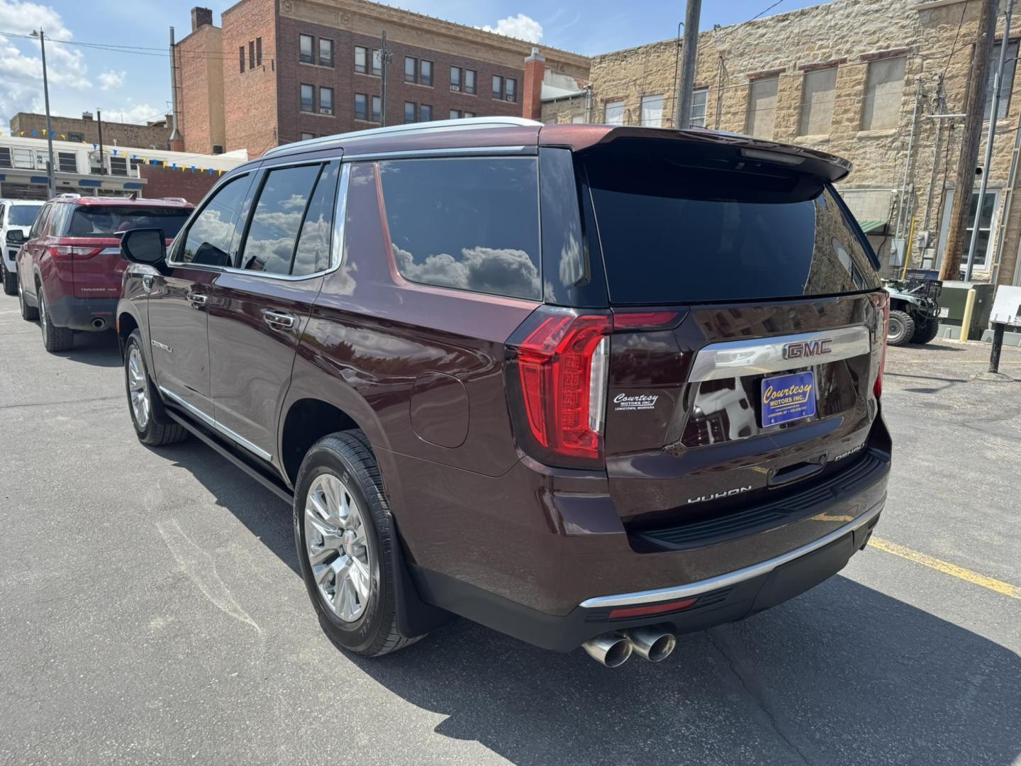 2022 Dark Bronze /Black GMC Yukon Denali 4WD (1GKS2DKL0NR) with an 6.2L V8 OHV 16V engine, 10A transmission, located at 116 5th Avenue South, Lewistown, MT, 59457, 47.063877, -109.427879 - For sale is a 2022 GMC Yukon Denali 4WD powered by the legendary 6.2L V8 engine paired with a 10-speed automatic transmission. This full-size SUV delivers 420 horsepower and 460 lb-ft of torque, offering impressive towing capability and smooth, confident performance in all driving conditions. The D - Photo#4