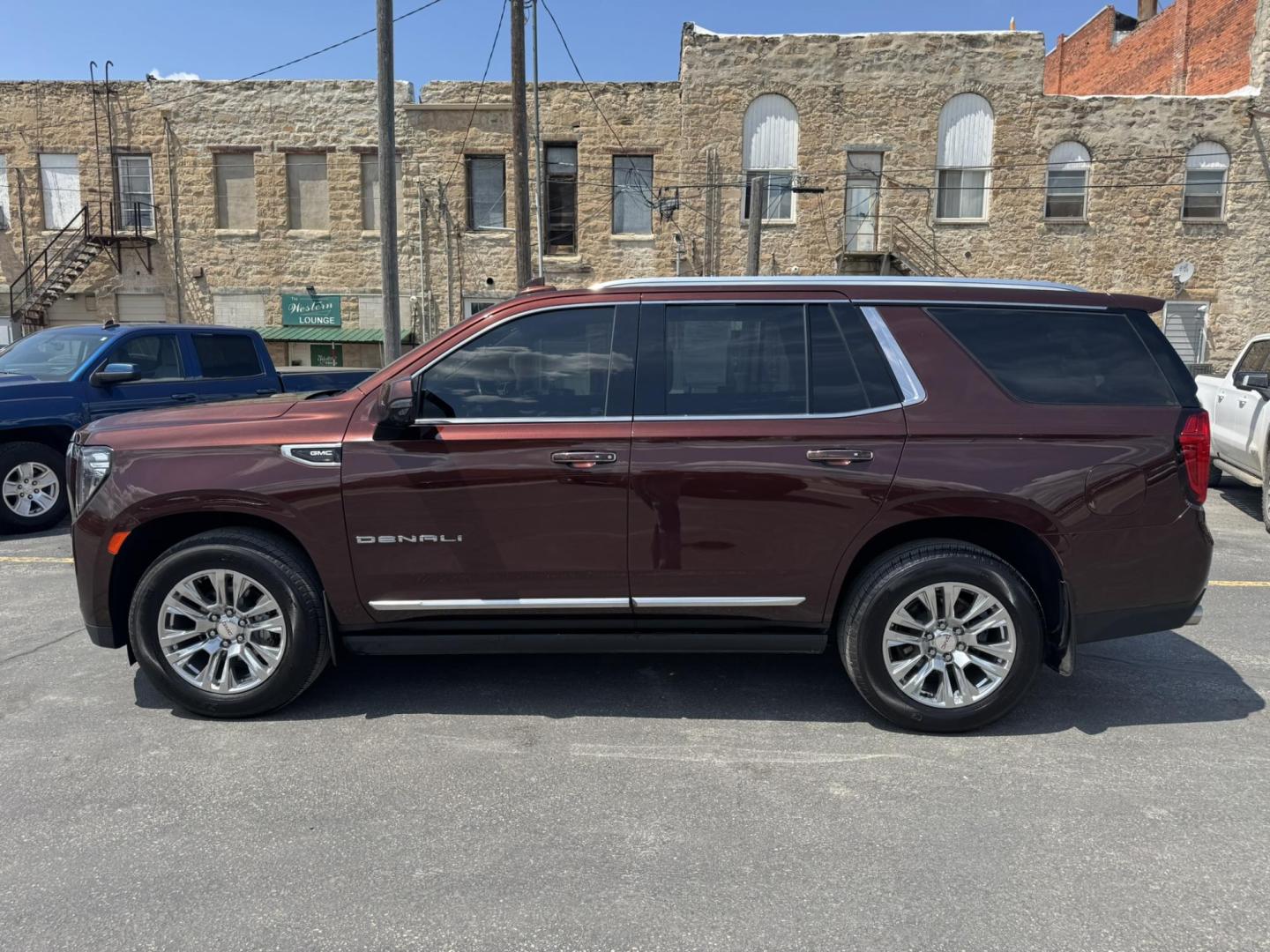 2022 Dark Bronze /Black GMC Yukon Denali 4WD (1GKS2DKL0NR) with an 6.2L V8 OHV 16V engine, 10A transmission, located at 116 5th Avenue South, Lewistown, MT, 59457, 47.063877, -109.427879 - For sale is a 2022 GMC Yukon Denali 4WD powered by the legendary 6.2L V8 engine paired with a 10-speed automatic transmission. This full-size SUV delivers 420 horsepower and 460 lb-ft of torque, offering impressive towing capability and smooth, confident performance in all driving conditions. The D - Photo#5