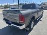 2012 Grey /Black Dodge Ram 3500 Laramie Mega Cab 4WD (3C63D3ML6CG) with an 6.7L L6 OHV 24V TURBO DIESEL engine, 6-Speed Automatic transmission, located at 116 5th Avenue South, Lewistown, MT, 59457, 47.063877, -109.427879 - 2012 Ram 3500 Laramie Mega Cab 4WD – Cummins Diesel – 98K Miles – Roll Coal in Style ? If you've ever looked at a semi-truck and thought, "Yeah, I could do that… if it had leather seats, a heated steering wheel, and Bluetooth", then this truck might just be your soulmate. This 2012 Ram 350 - Photo#2