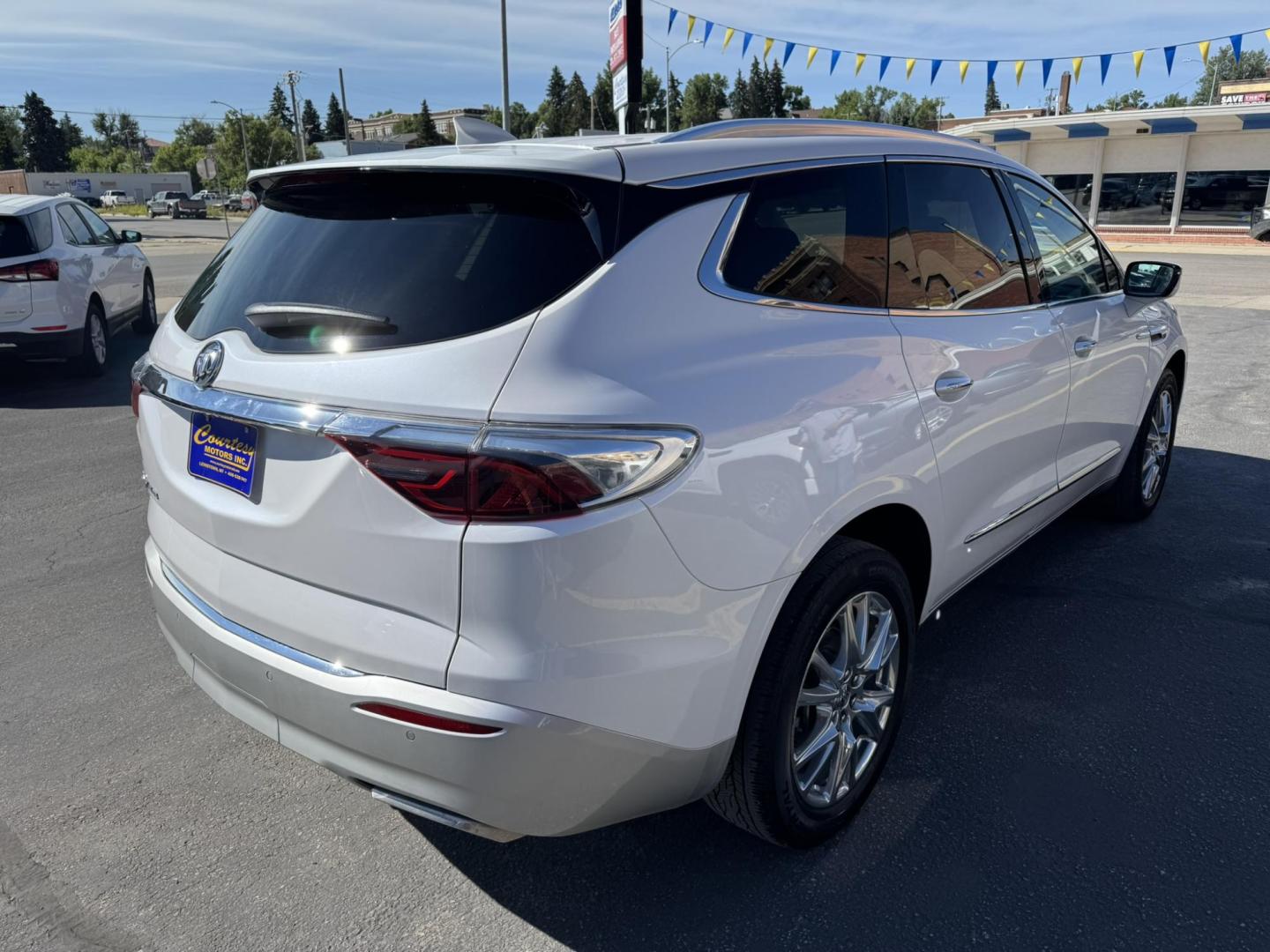 2023 WHITE /BEIGE Buick Enclave Essence AWD (5GAEVAKW1PJ) with an 3.6L V6 DOHC 24V engine, 9A transmission, located at 116 5th Avenue South, Lewistown, MT, 59457, 47.063877, -109.427879 - 2023 Buick Enclave Essence AWD – Rare Tan Leather – Low Miles, High Comfort This 2023 Buick Enclave Essence AWD is the perfect blend of style, space, and smooth performance — and it comes with one of the most sought-after interior options: beautiful, hard-to-find tan leather. If you’re look - Photo#2