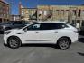 2023 WHITE /BEIGE Buick Enclave Essence AWD (5GAEVAKW1PJ) with an 3.6L V6 DOHC 24V engine, 9A transmission, located at 116 5th Avenue South, Lewistown, MT, 59457, 47.063877, -109.427879 - 2023 Buick Enclave Essence AWD – Rare Tan Leather – Low Miles, High Comfort This 2023 Buick Enclave Essence AWD is the perfect blend of style, space, and smooth performance — and it comes with one of the most sought-after interior options: beautiful, hard-to-find tan leather. If you’re look - Photo#5