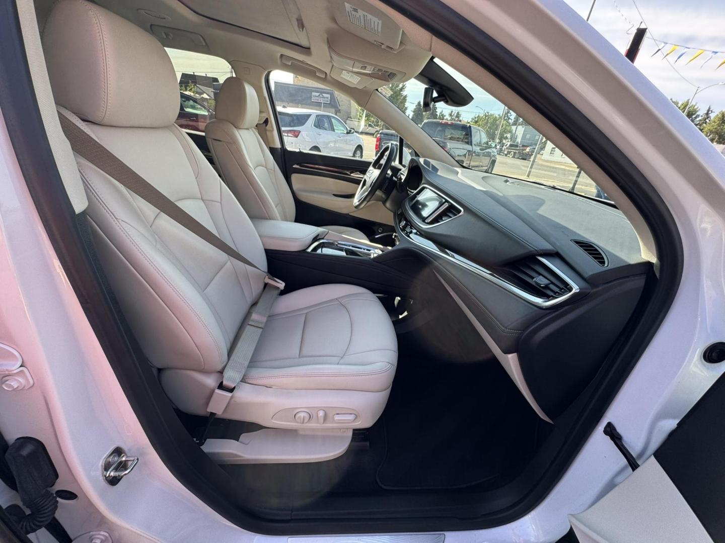 2023 WHITE /BEIGE Buick Enclave Essence AWD (5GAEVAKW1PJ) with an 3.6L V6 DOHC 24V engine, 9A transmission, located at 116 5th Avenue South, Lewistown, MT, 59457, 47.063877, -109.427879 - 2023 Buick Enclave Essence AWD – Rare Tan Leather – Low Miles, High Comfort This 2023 Buick Enclave Essence AWD is the perfect blend of style, space, and smooth performance — and it comes with one of the most sought-after interior options: beautiful, hard-to-find tan leather. If you’re look - Photo#7
