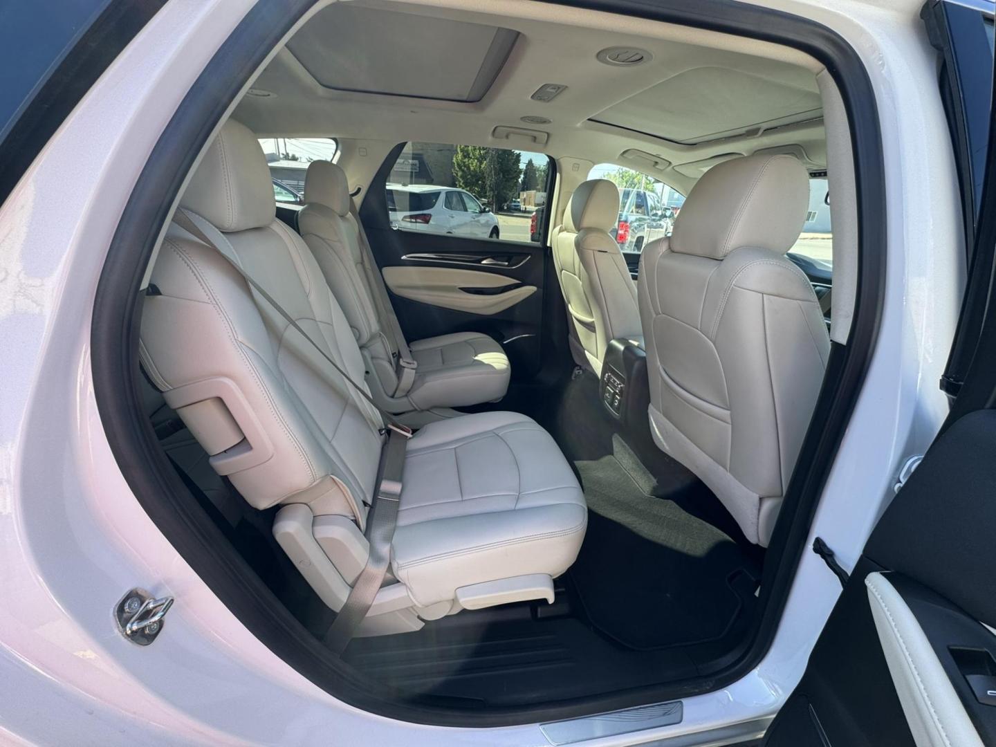 2023 WHITE /BEIGE Buick Enclave Essence AWD (5GAEVAKW1PJ) with an 3.6L V6 DOHC 24V engine, 9A transmission, located at 116 5th Avenue South, Lewistown, MT, 59457, 47.063877, -109.427879 - 2023 Buick Enclave Essence AWD – Rare Tan Leather – Low Miles, High Comfort This 2023 Buick Enclave Essence AWD is the perfect blend of style, space, and smooth performance — and it comes with one of the most sought-after interior options: beautiful, hard-to-find tan leather. If you’re look - Photo#8