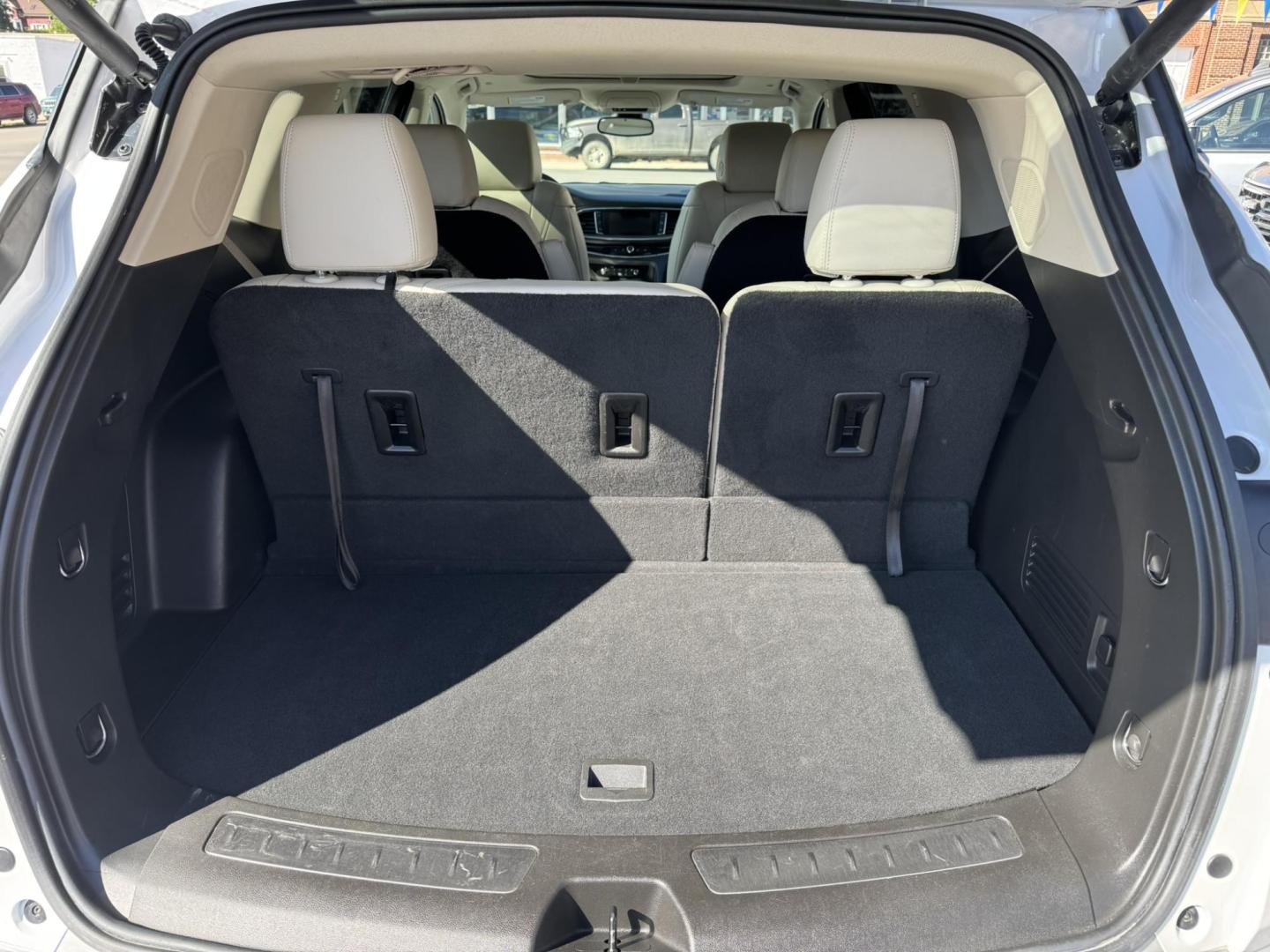 2023 WHITE /BEIGE Buick Enclave Essence AWD (5GAEVAKW1PJ) with an 3.6L V6 DOHC 24V engine, 9A transmission, located at 116 5th Avenue South, Lewistown, MT, 59457, 47.063877, -109.427879 - 2023 Buick Enclave Essence AWD – Rare Tan Leather – Low Miles, High Comfort This 2023 Buick Enclave Essence AWD is the perfect blend of style, space, and smooth performance — and it comes with one of the most sought-after interior options: beautiful, hard-to-find tan leather. If you’re look - Photo#11