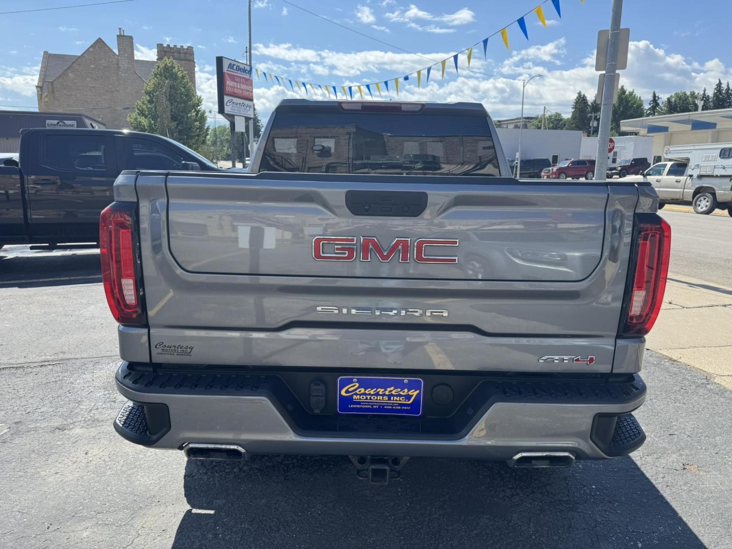 2021 Grey /Black/Brown GMC Sierra 1500 AT4 Crew Cab Short Box 4WD (1GTP9EEL8MZ) with an 6.2L V8 OHV 16V engine, 6A transmission, located at 116 5th Avenue South, Lewistown, MT, 59457, 47.063877, -109.427879 - 2021 GMC Sierra 1500 Crew Cab AT4 with the powerful 6.2L V8 and 10-speed automatic. This truck delivers 420 horsepower with a factory 2-inch lift, off-road tuned suspension, and aggressive all-terrain tires, ready for any adventure. Inside you’ll find premium leather seats, heated and ventilate - Photo#3