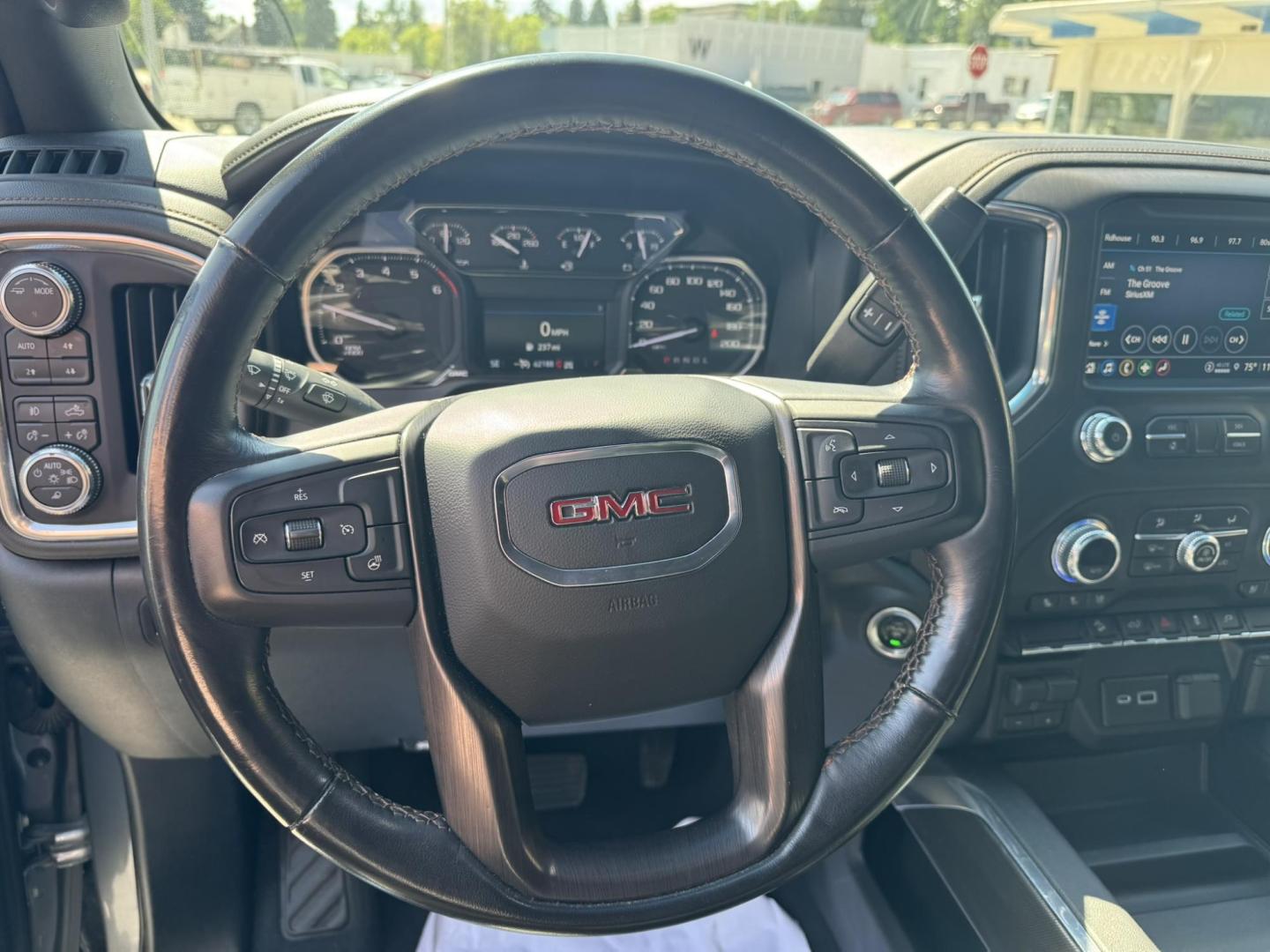 2021 Grey /Black/Brown GMC Sierra 1500 AT4 Crew Cab Short Box 4WD (1GTP9EEL8MZ) with an 6.2L V8 OHV 16V engine, 6A transmission, located at 116 5th Avenue South, Lewistown, MT, 59457, 47.063877, -109.427879 - 2021 GMC Sierra 1500 Crew Cab AT4 with the powerful 6.2L V8 and 10-speed automatic. This truck delivers 420 horsepower with a factory 2-inch lift, off-road tuned suspension, and aggressive all-terrain tires, ready for any adventure. Inside you’ll find premium leather seats, heated and ventilate - Photo#14