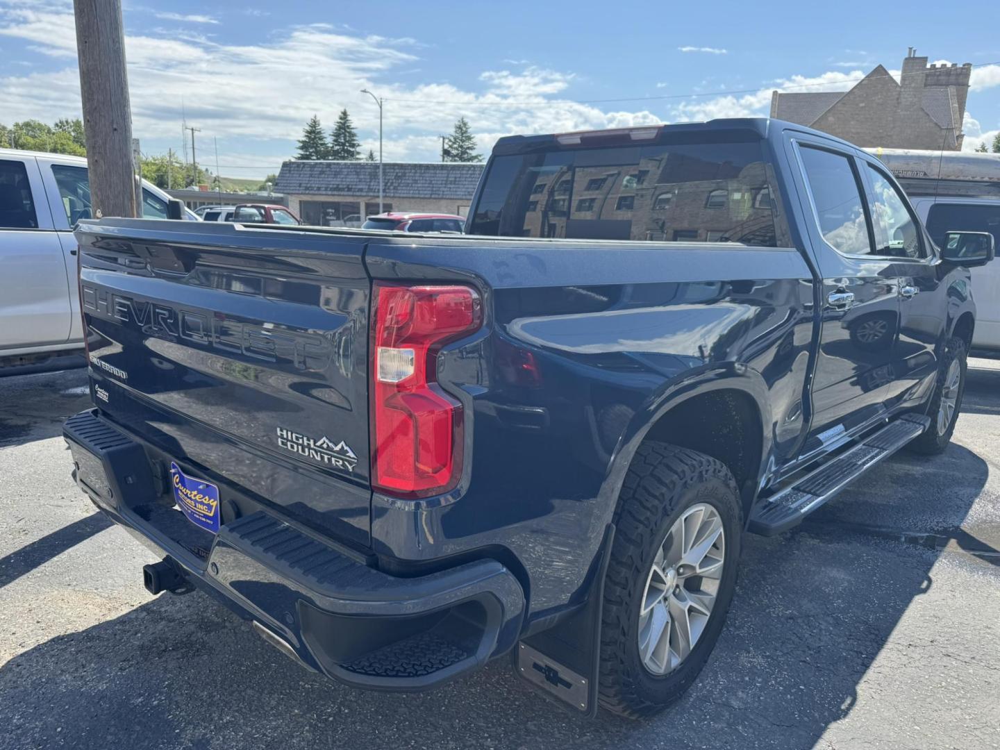 2020 Blue /Black Chevrolet Silverado 1500 High Country Crew Cab Long Box 4WD (1GCUYHELXLZ) with an 6.2L V8 OHV 16V engine, 6A transmission, located at 116 5th Avenue South, Lewistown, MT, 59457, 47.063877, -109.427879 - 2020 Chevrolet Silverado 1500 Crew Cab High Country, the perfect blend of premium comfort and powerful performance. Equipped with a strong V8 engine and smooth-shifting transmission, this truck delivers plenty of muscle for towing, hauling, or everyday driving. The High Country trim surrounds you - Photo#1