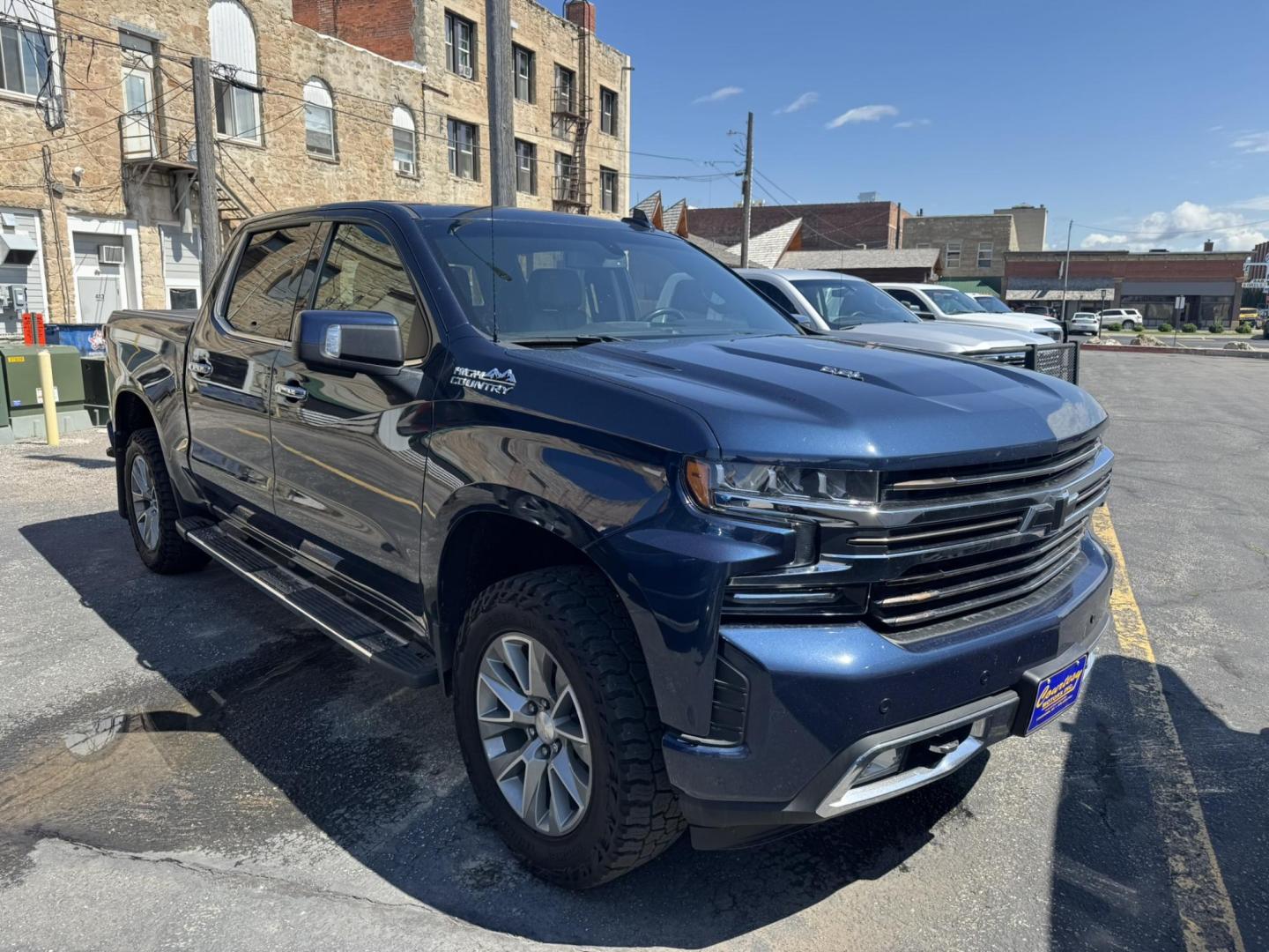 2020 Blue /Black Chevrolet Silverado 1500 High Country Crew Cab Long Box 4WD (1GCUYHELXLZ) with an 6.2L V8 OHV 16V engine, 6A transmission, located at 116 5th Avenue South, Lewistown, MT, 59457, 47.063877, -109.427879 - 2020 Chevrolet Silverado 1500 Crew Cab High Country, the perfect blend of premium comfort and powerful performance. Equipped with a strong V8 engine and smooth-shifting transmission, this truck delivers plenty of muscle for towing, hauling, or everyday driving. The High Country trim surrounds you - Photo#0
