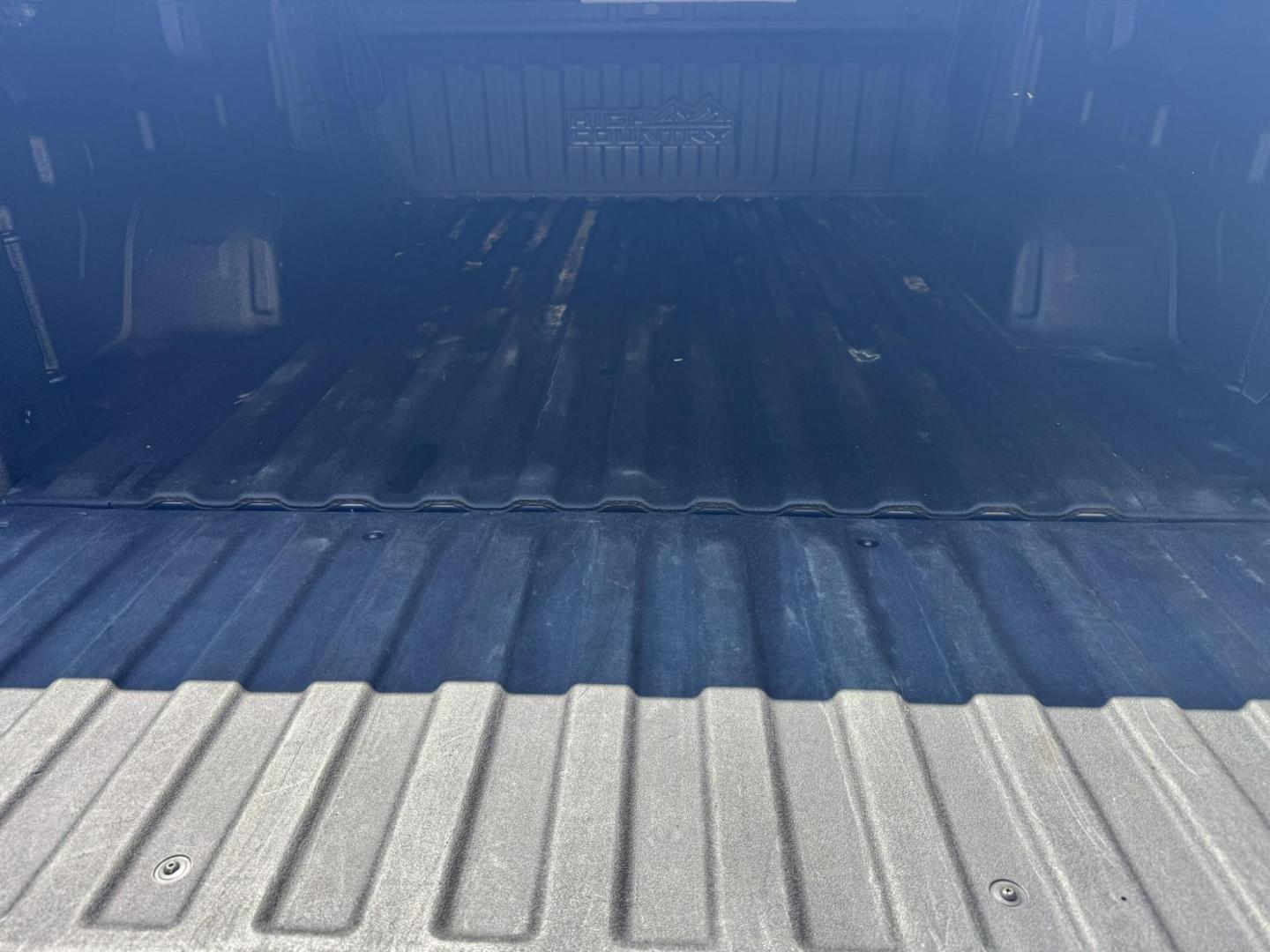 2020 Blue /Black Chevrolet Silverado 1500 High Country Crew Cab Long Box 4WD (1GCUYHELXLZ) with an 6.2L V8 OHV 16V engine, 6A transmission, located at 116 5th Avenue South, Lewistown, MT, 59457, 47.063877, -109.427879 - 2020 Chevrolet Silverado 1500 Crew Cab High Country, the perfect blend of premium comfort and powerful performance. Equipped with a strong V8 engine and smooth-shifting transmission, this truck delivers plenty of muscle for towing, hauling, or everyday driving. The High Country trim surrounds you - Photo#3