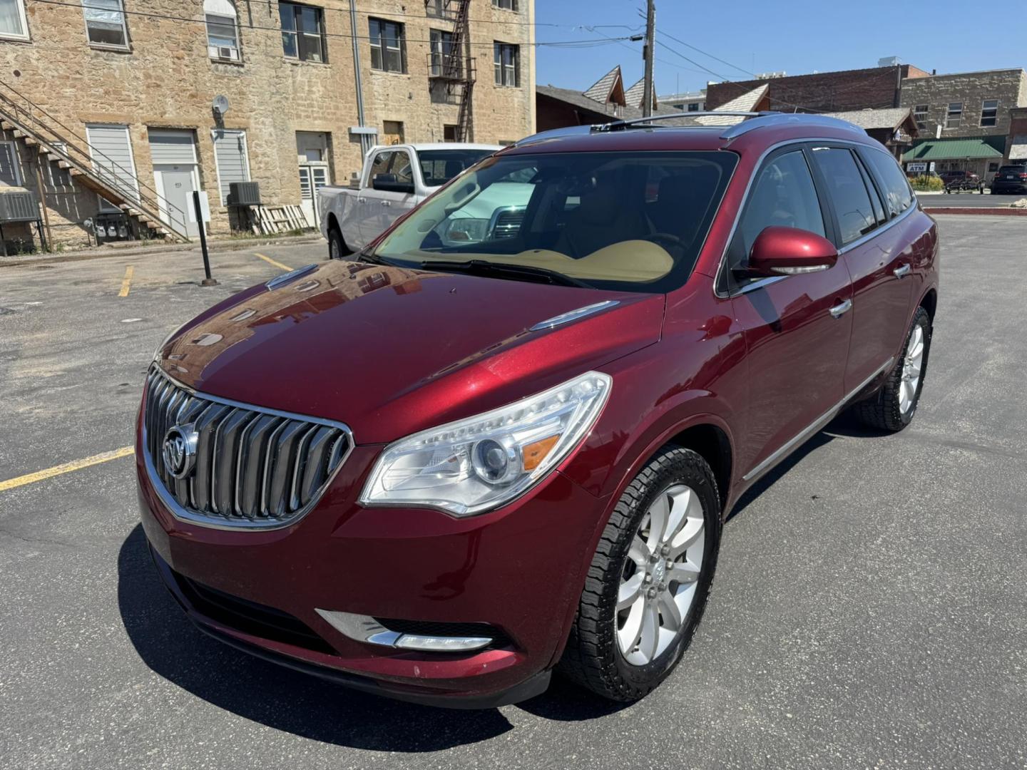 2015 Maroon /BEIGE Buick Enclave Premium AWD (5GAKVCKD9FJ) with an 3.6L V6 DOHC 24V engine, 6-Speed Automatic Overdrive transmission, located at 116 5th Avenue South, Lewistown, MT, 59457, 47.063877, -109.427879 - Looking for a 3rd row SUV that rides like a luxury sedan? This 2015 Buick Enclave Premium AWD delivers quiet comfort, smooth power, and plenty of space for the whole family. Premium trim means it’s loaded with features—heated and cooled leather seats, Bose audio, power liftgate, remote start, an - Photo#6