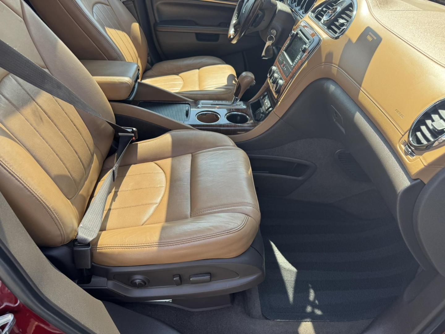 2015 Maroon /BEIGE Buick Enclave Premium AWD (5GAKVCKD9FJ) with an 3.6L V6 DOHC 24V engine, 6-Speed Automatic Overdrive transmission, located at 116 5th Avenue South, Lewistown, MT, 59457, 47.063877, -109.427879 - Looking for a 3rd row SUV that rides like a luxury sedan? This 2015 Buick Enclave Premium AWD delivers quiet comfort, smooth power, and plenty of space for the whole family. Premium trim means it’s loaded with features—heated and cooled leather seats, Bose audio, power liftgate, remote start, an - Photo#7